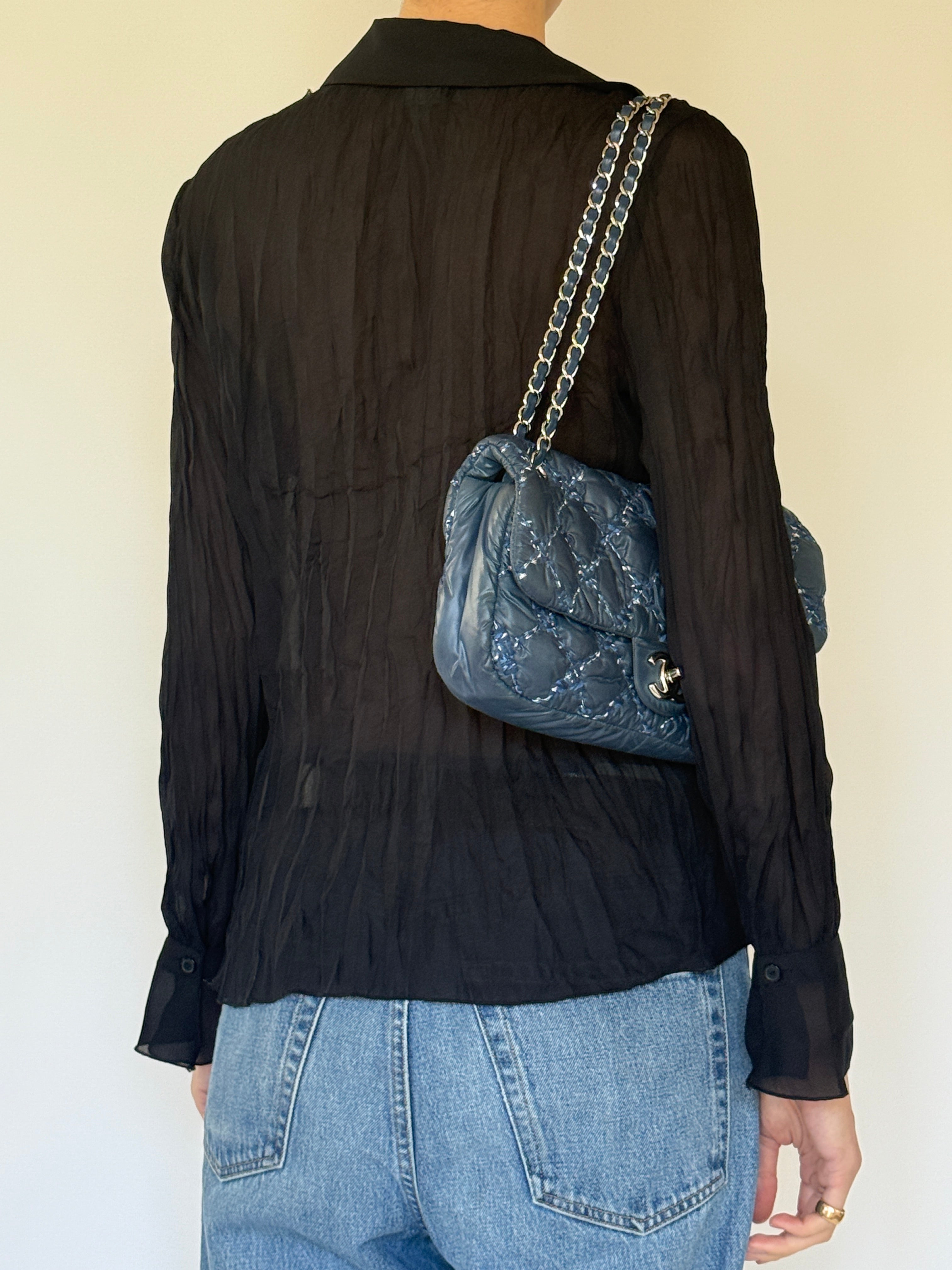 Vintage sheer black ruffle blouse back view