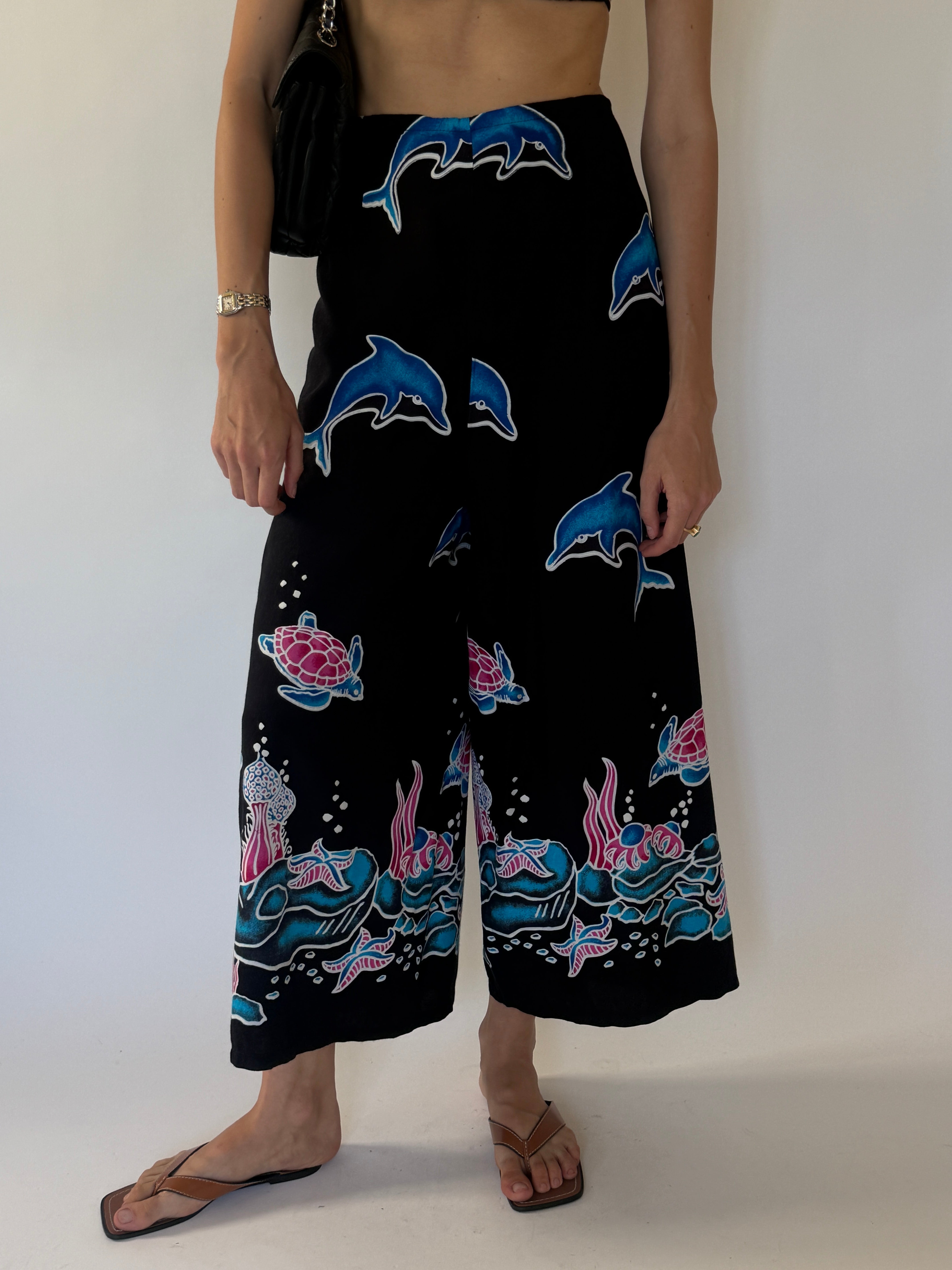 Vintage black ocean print wrap pants front view