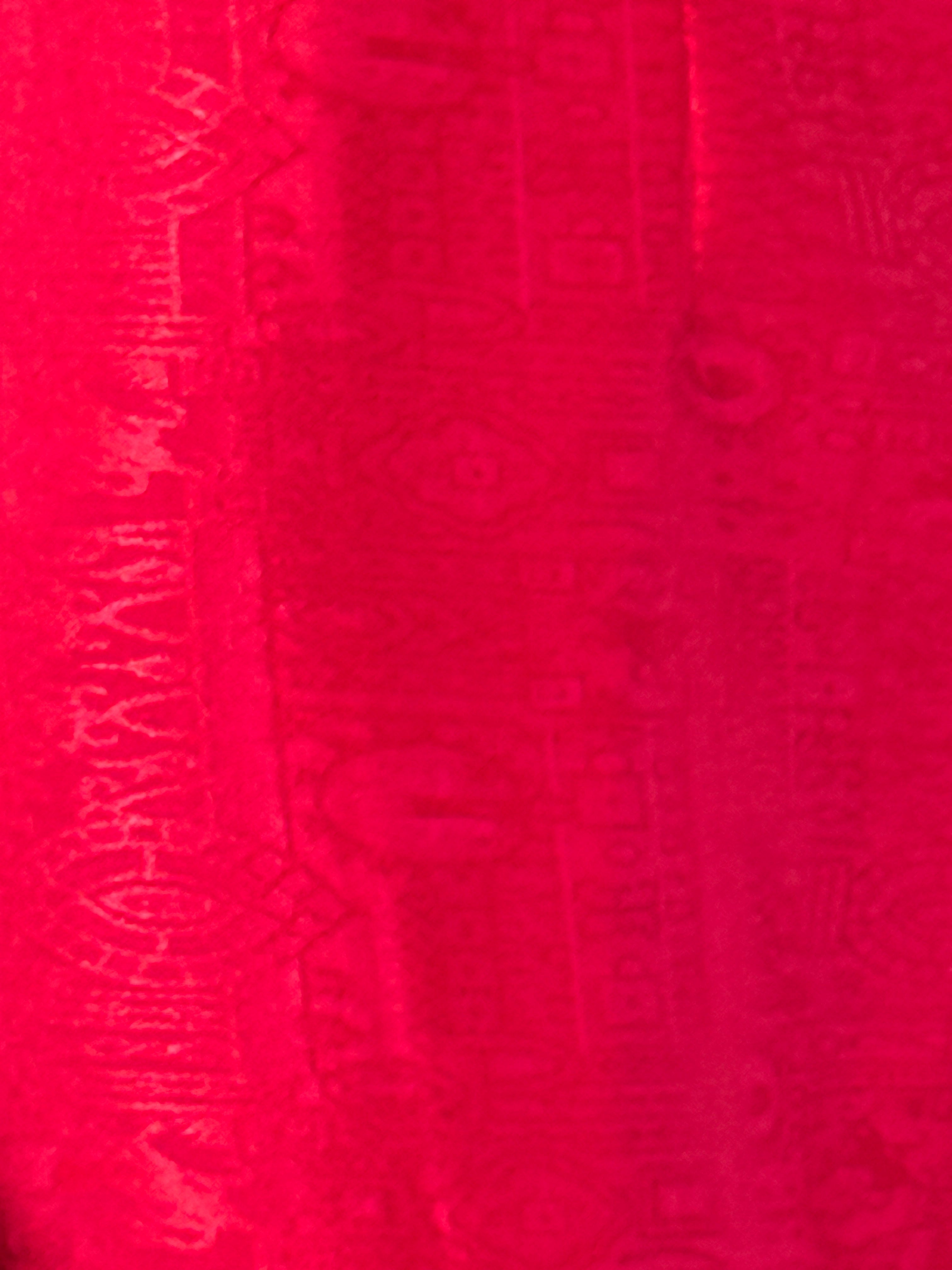 Vintage red wrap pants fabric close-up