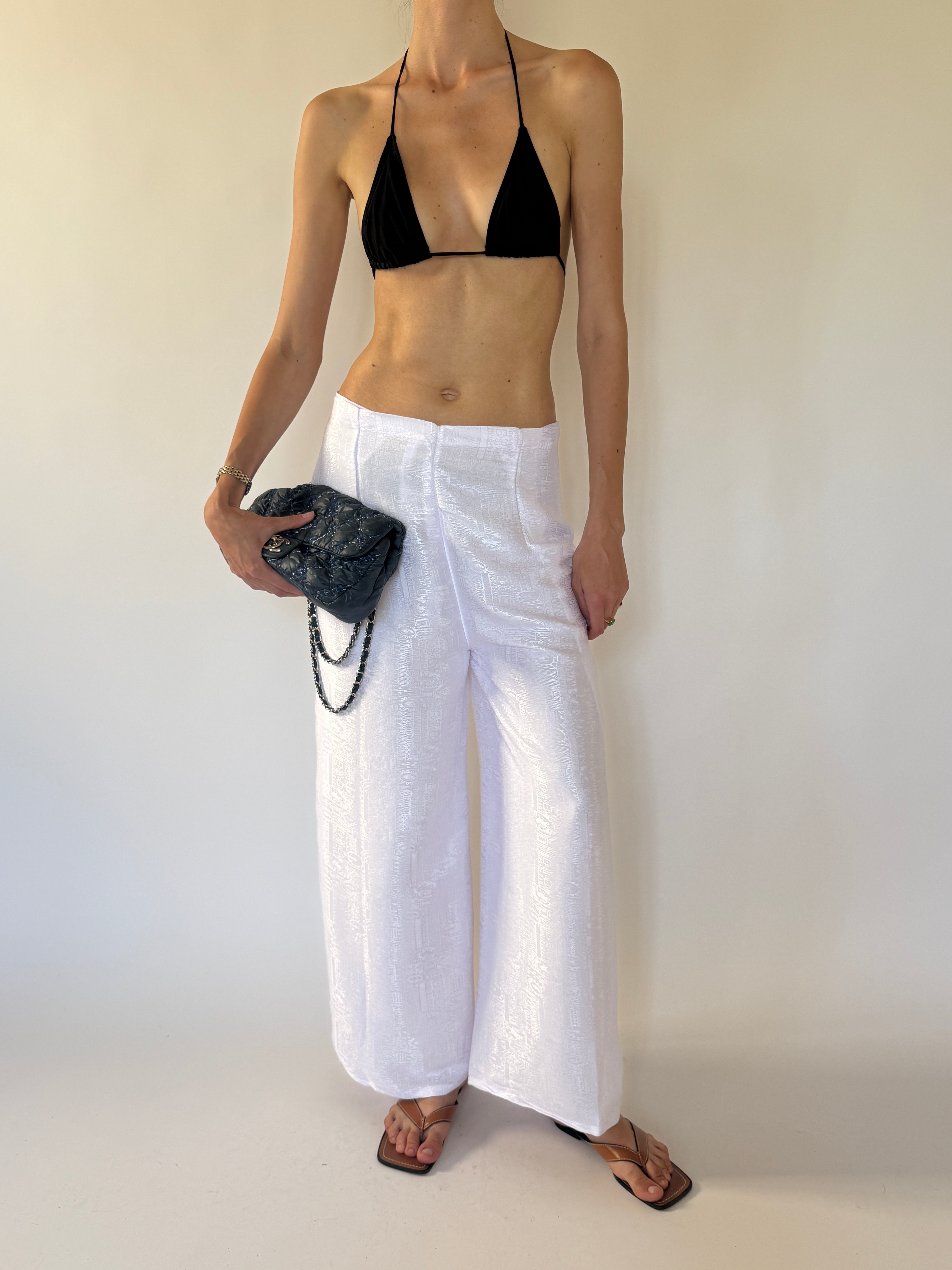 Vintage white textured wide-leg pants front view