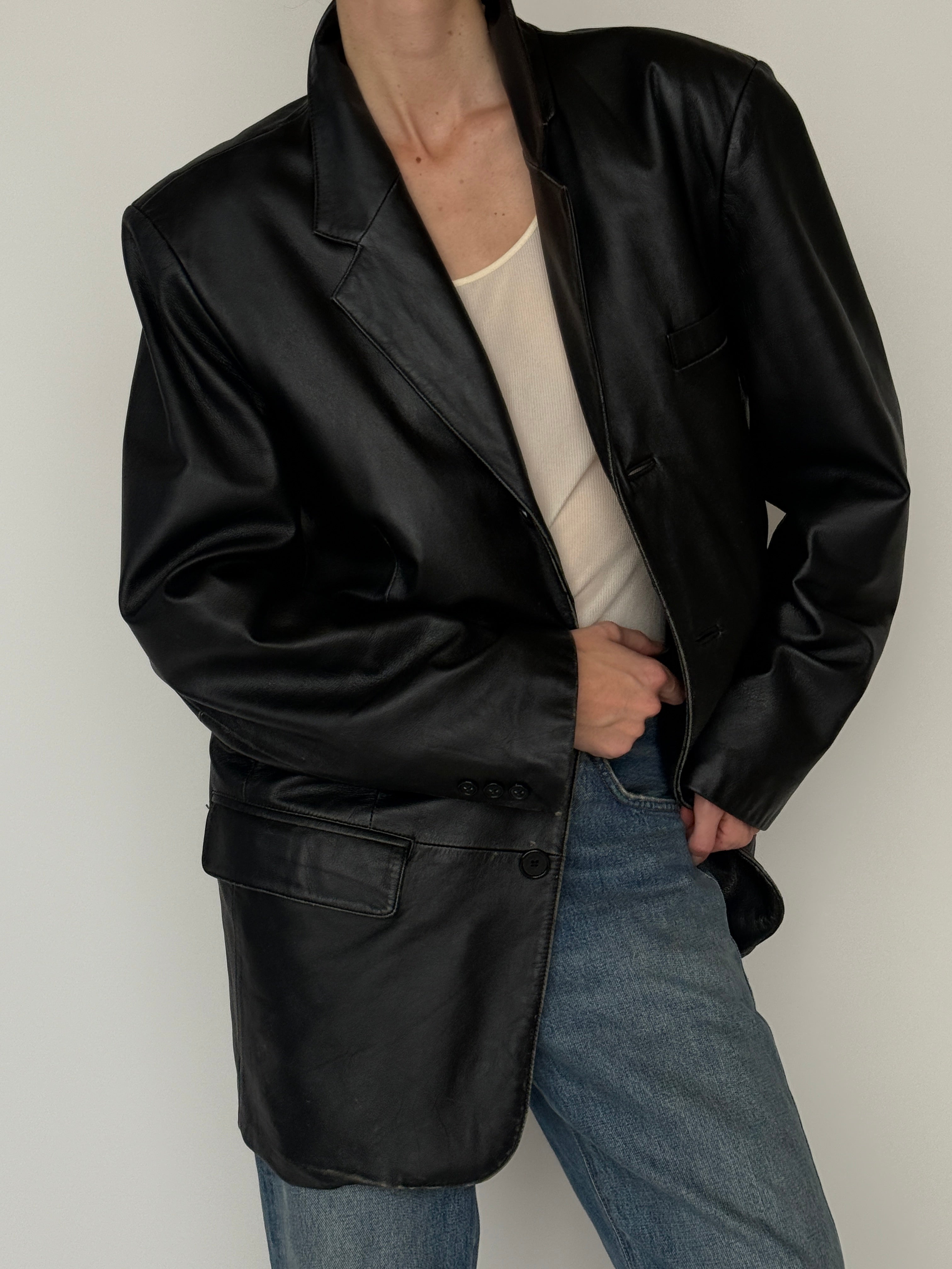 Vintage black leather blazer front button detail