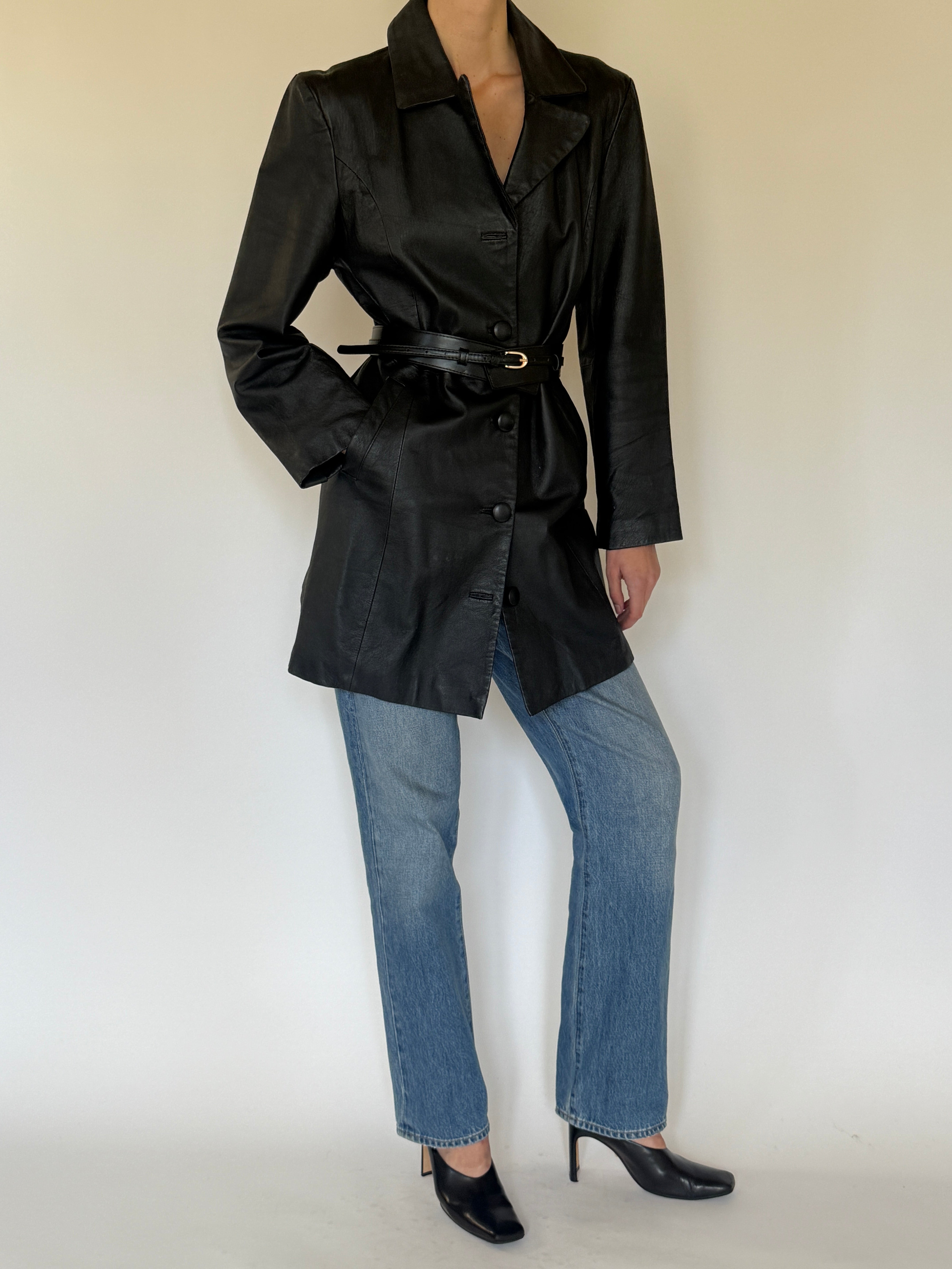 Vintage black leather coat waist seam shaping detail