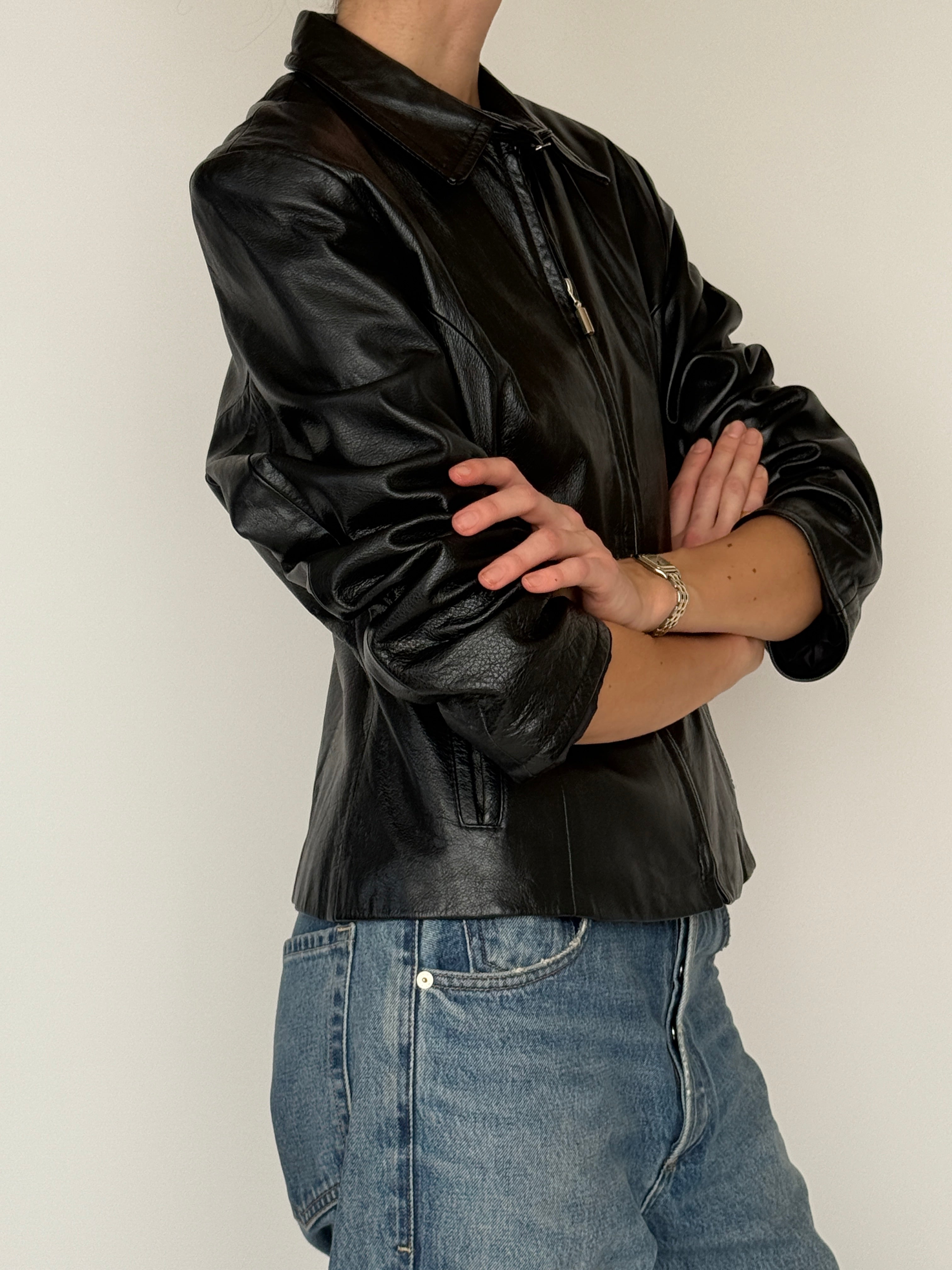 Vintage black leather jacket side view
