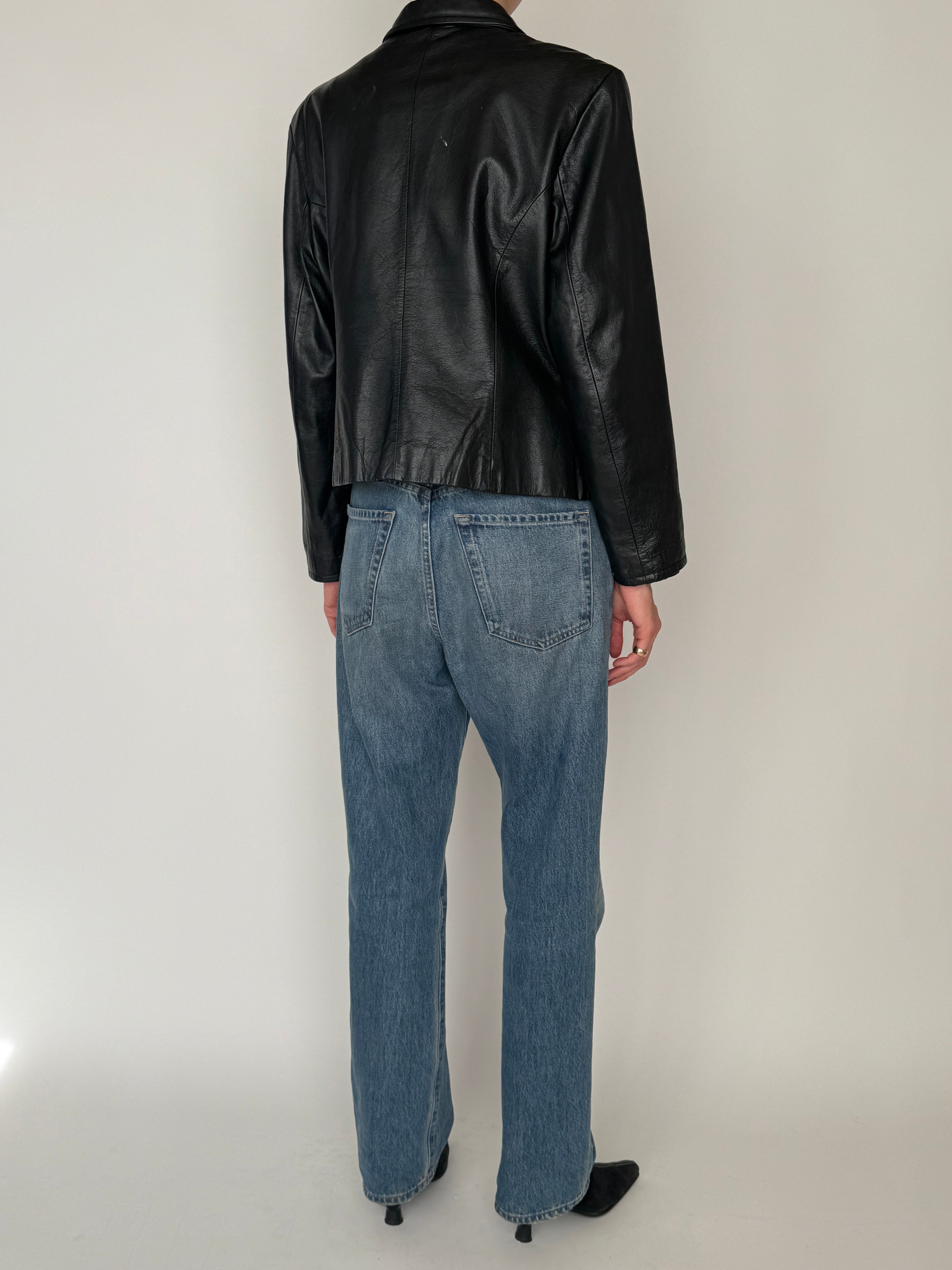 Vintage black leather zip jacket back view