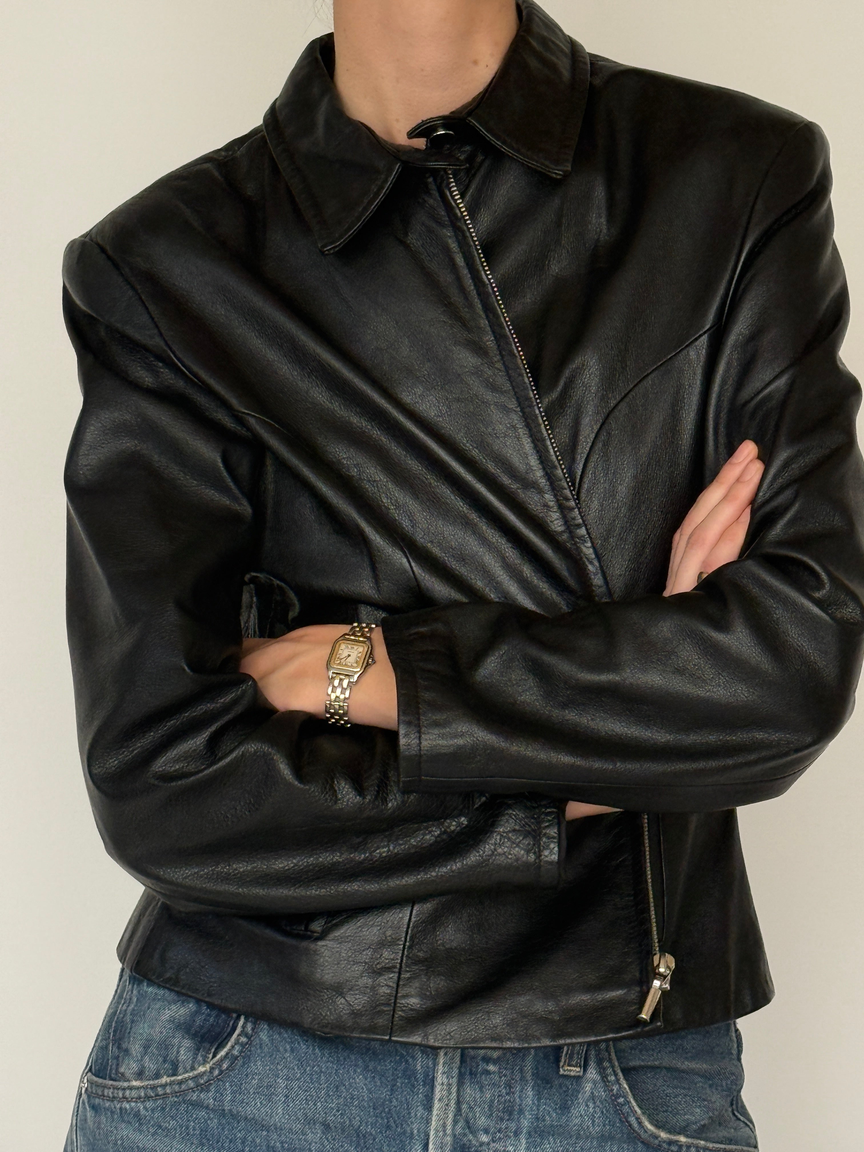 Vintage black leather jacket zipper detail