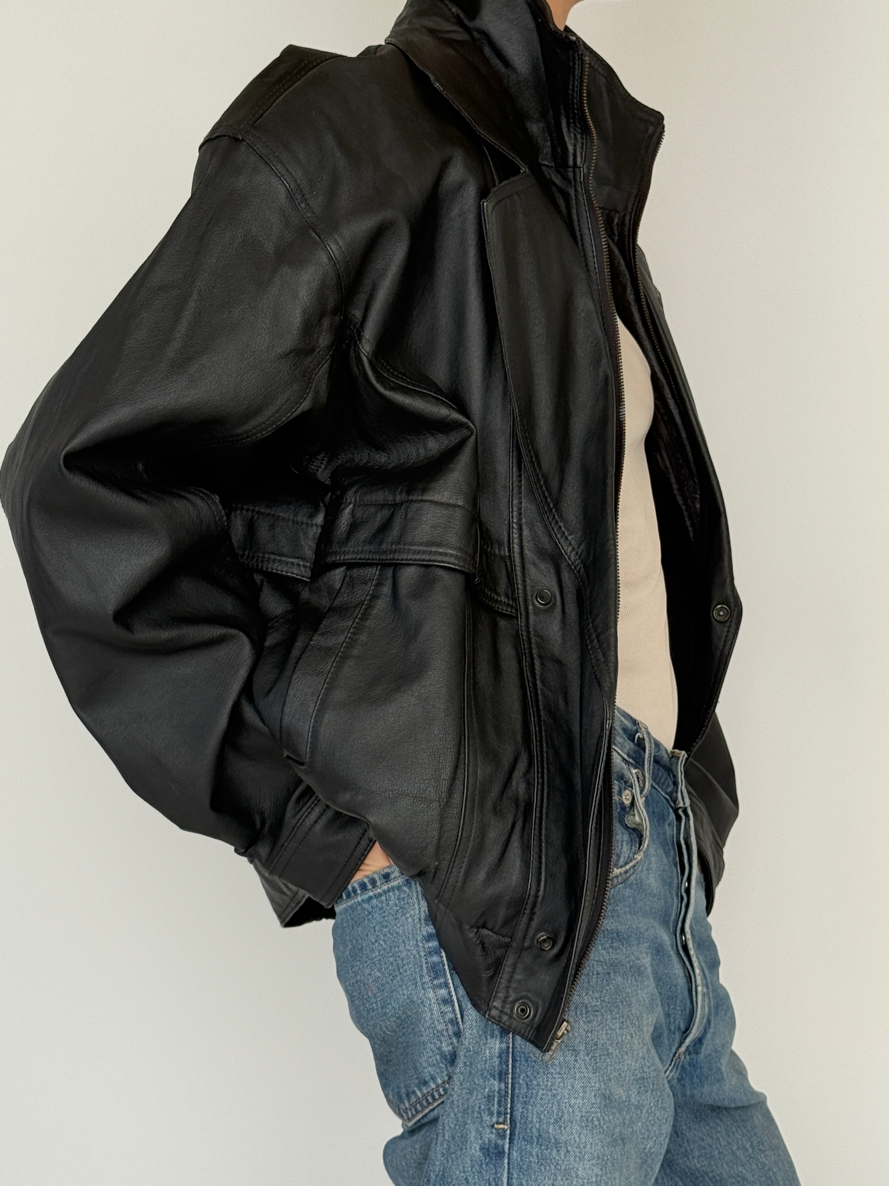 Vintage black leather jacket side view