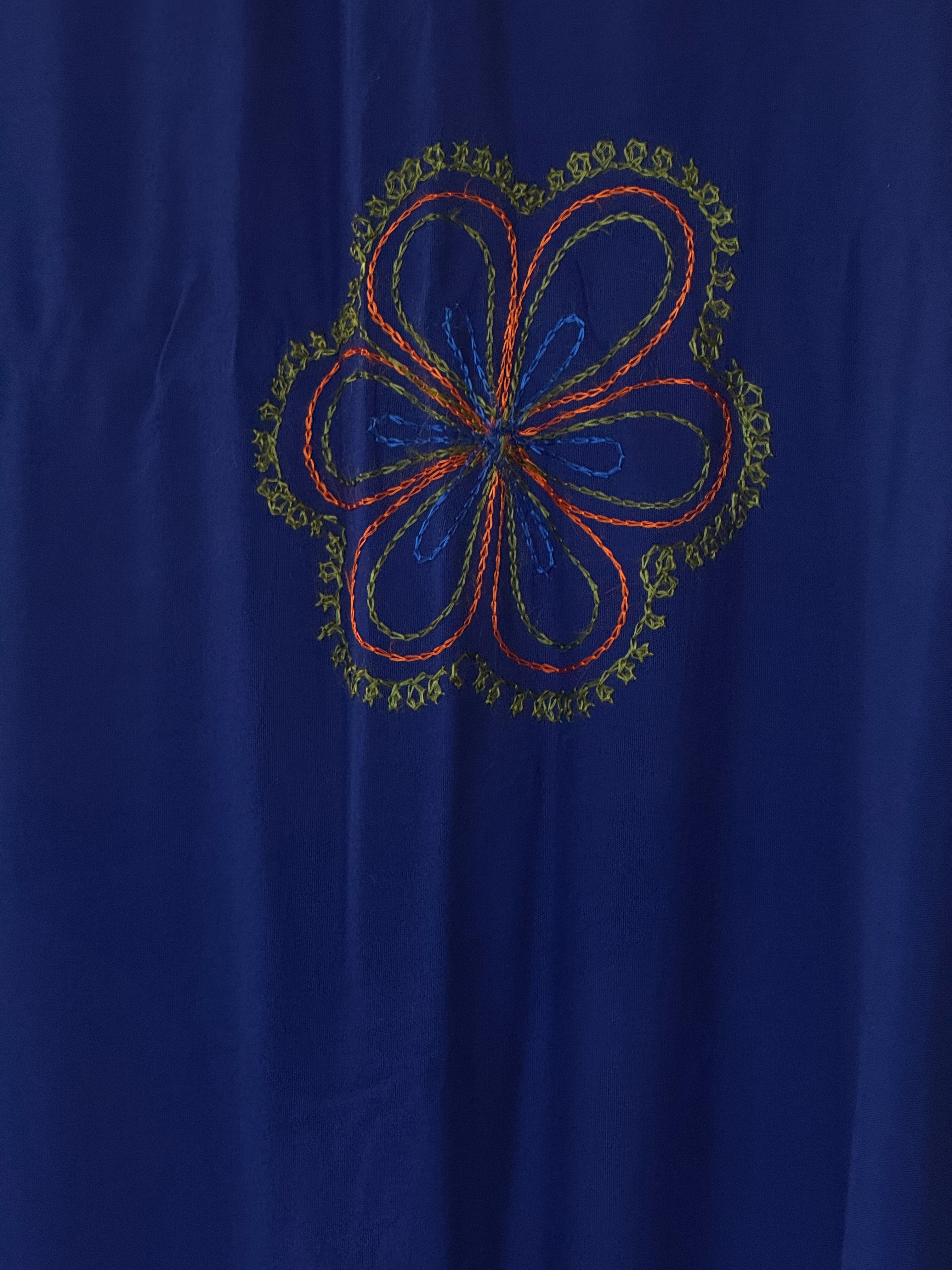 Vintage royal blue embroidered fabric detail