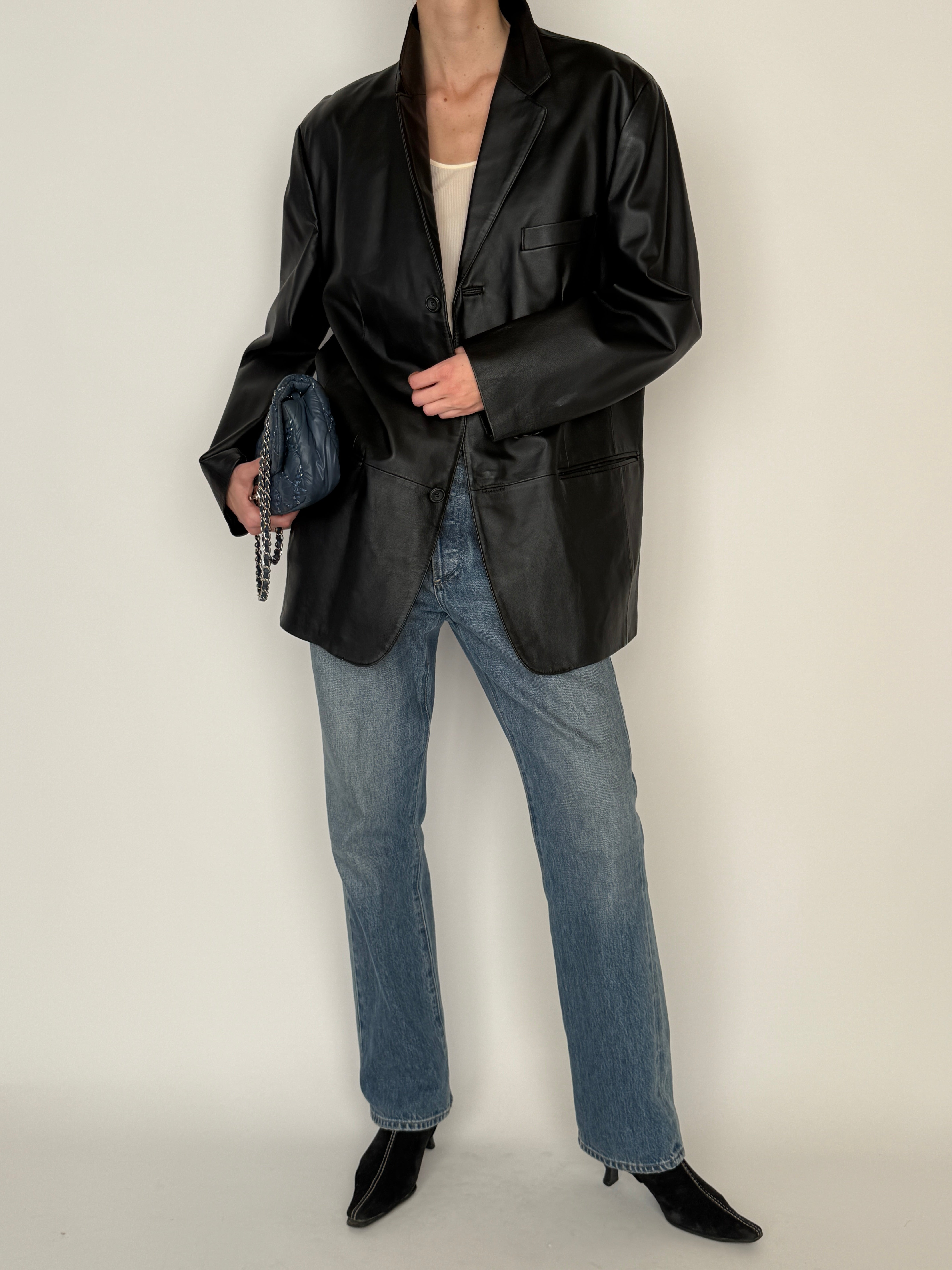 Vintage black leather blazer smooth leather texture