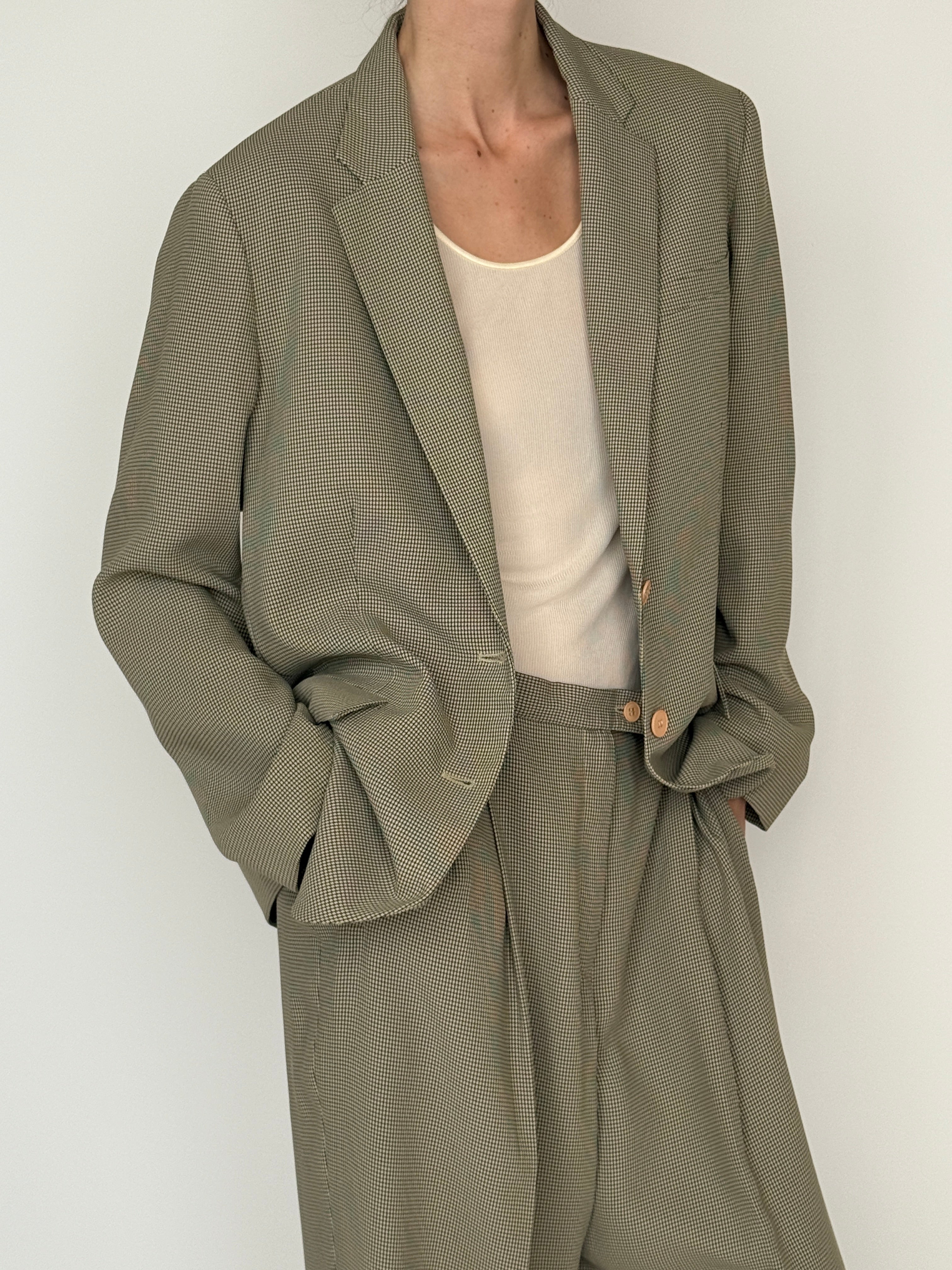 Vintage micro-check suit olive fabric close-up
