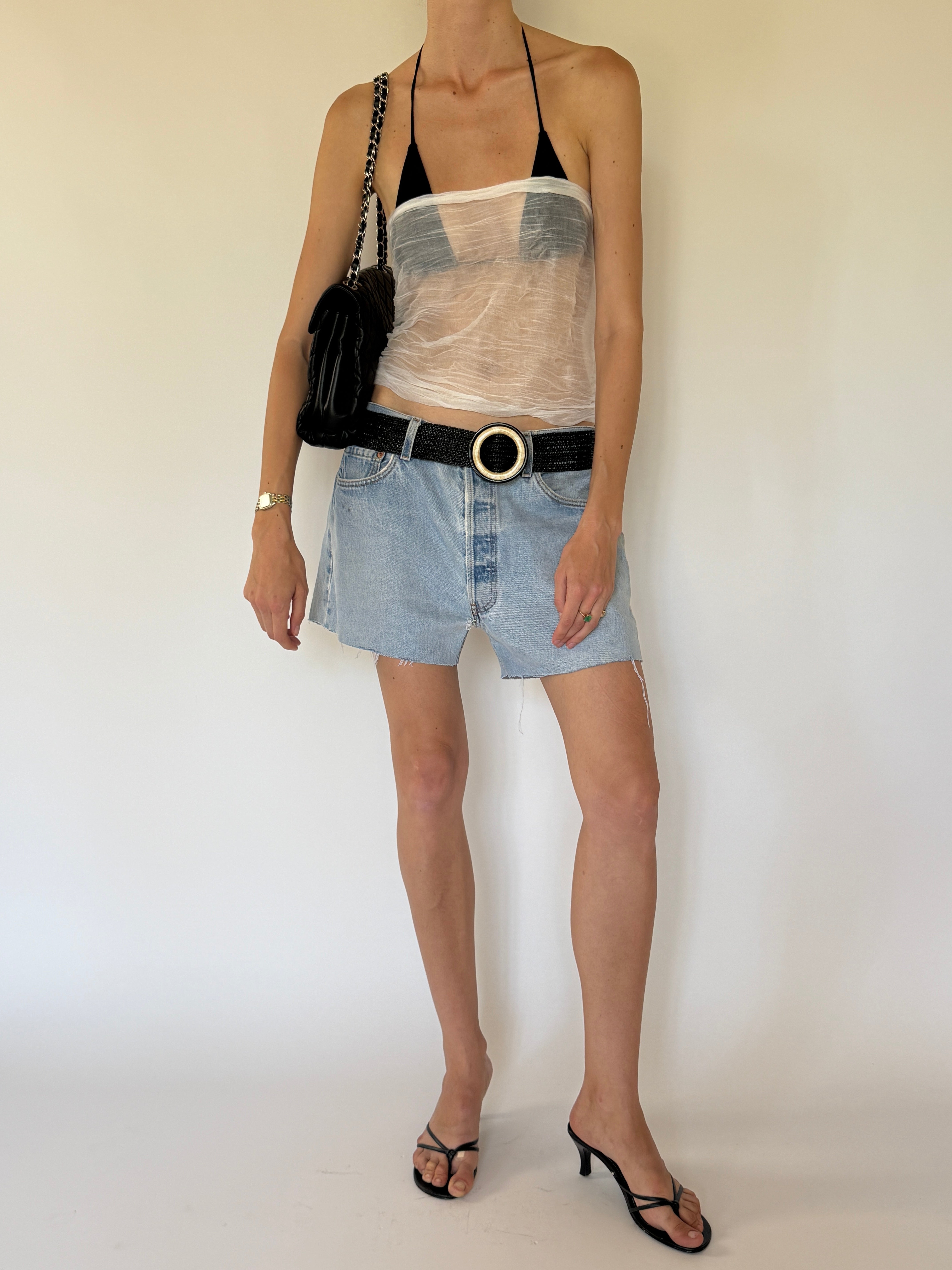 Vintage sheer white scarf worn as a strapless top angled view