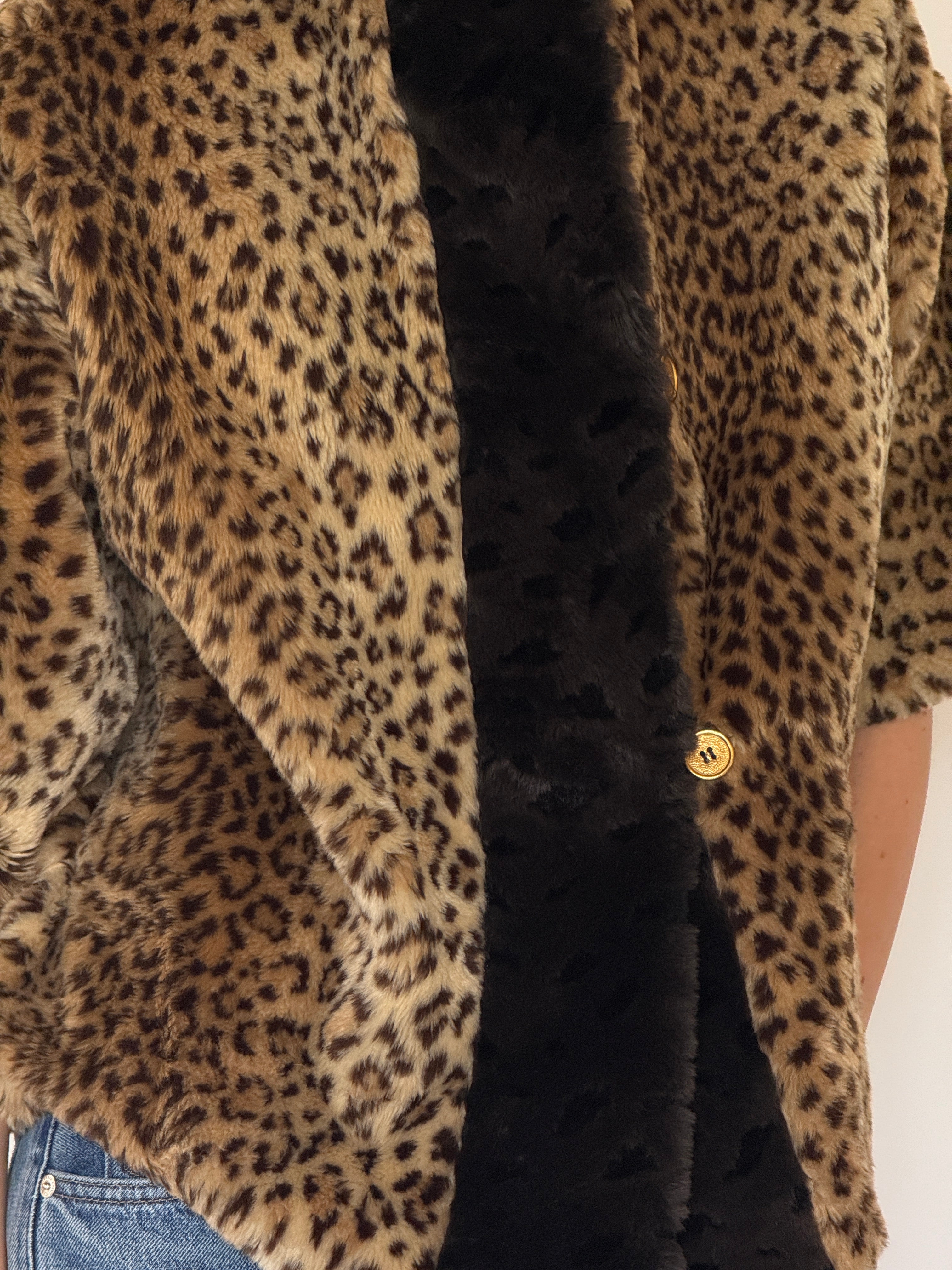 Vintage leopard faux fur fabric close-up
