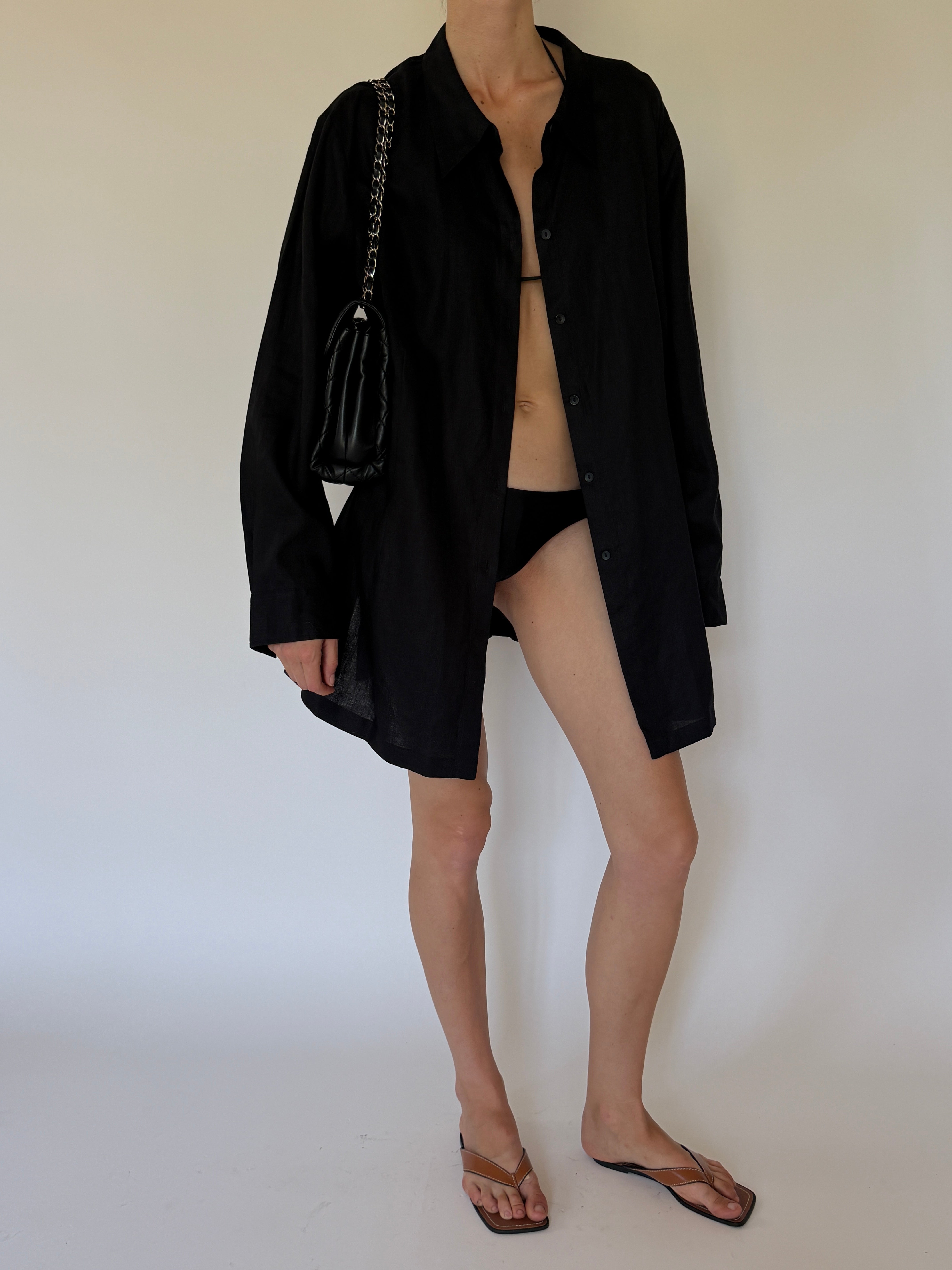 Vintage structured black shirt dress swim cover-up angled front view