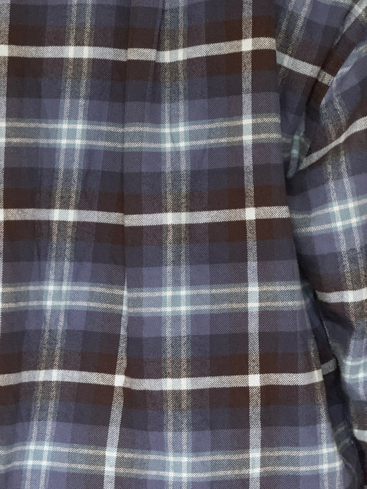 Vintage blue plaid flannel shirt 100% cotton fabric close-up