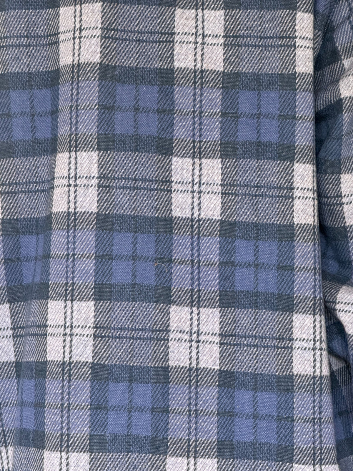 Vintage blue plaid fabric close-up
