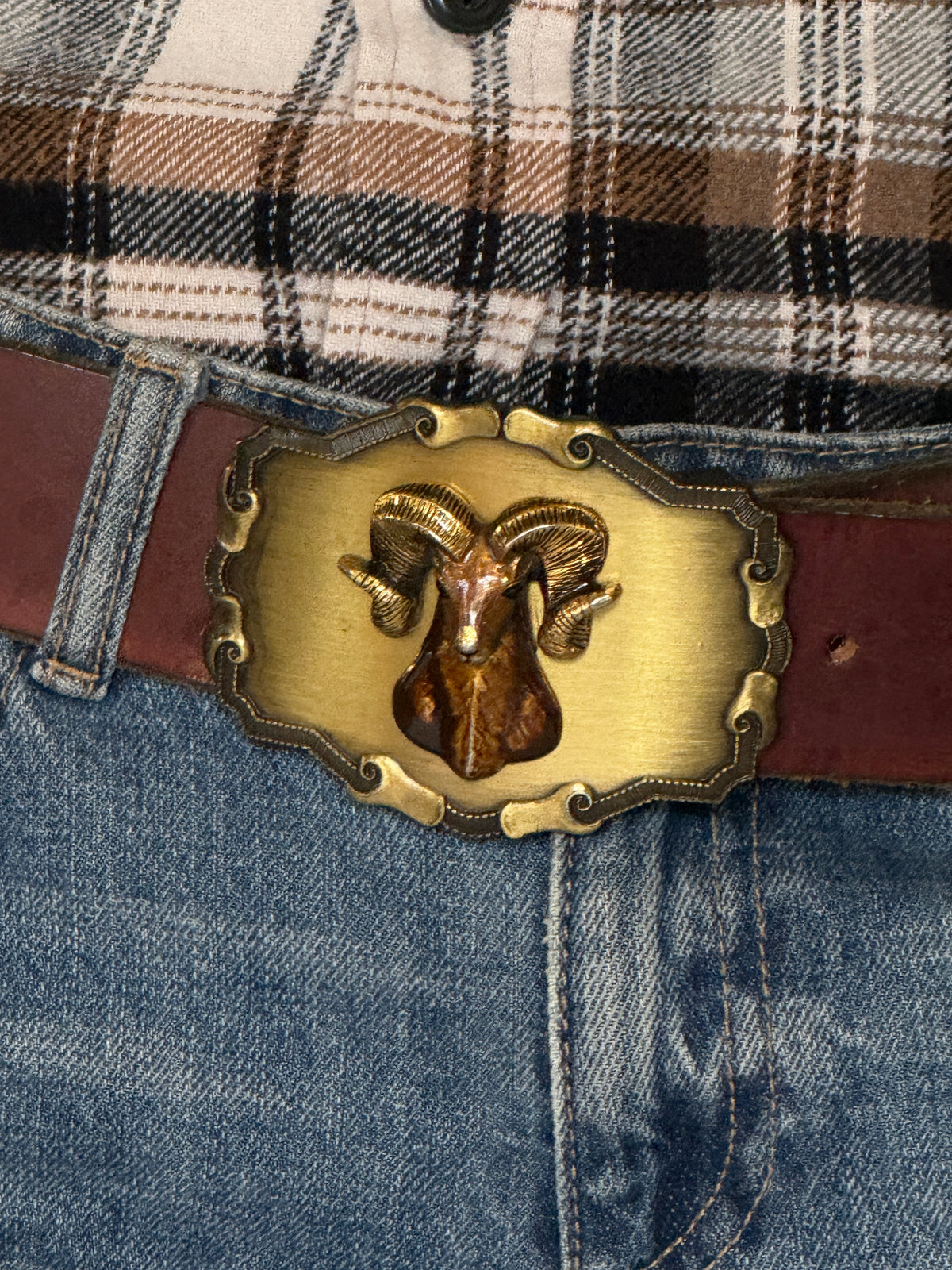 Vintage brown leather ram buckle belt front view