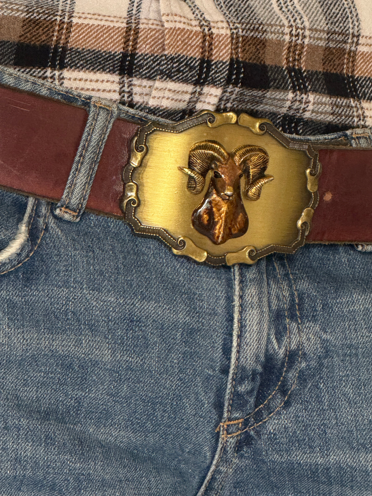 Vintage brown leather belt ornate buckle detail