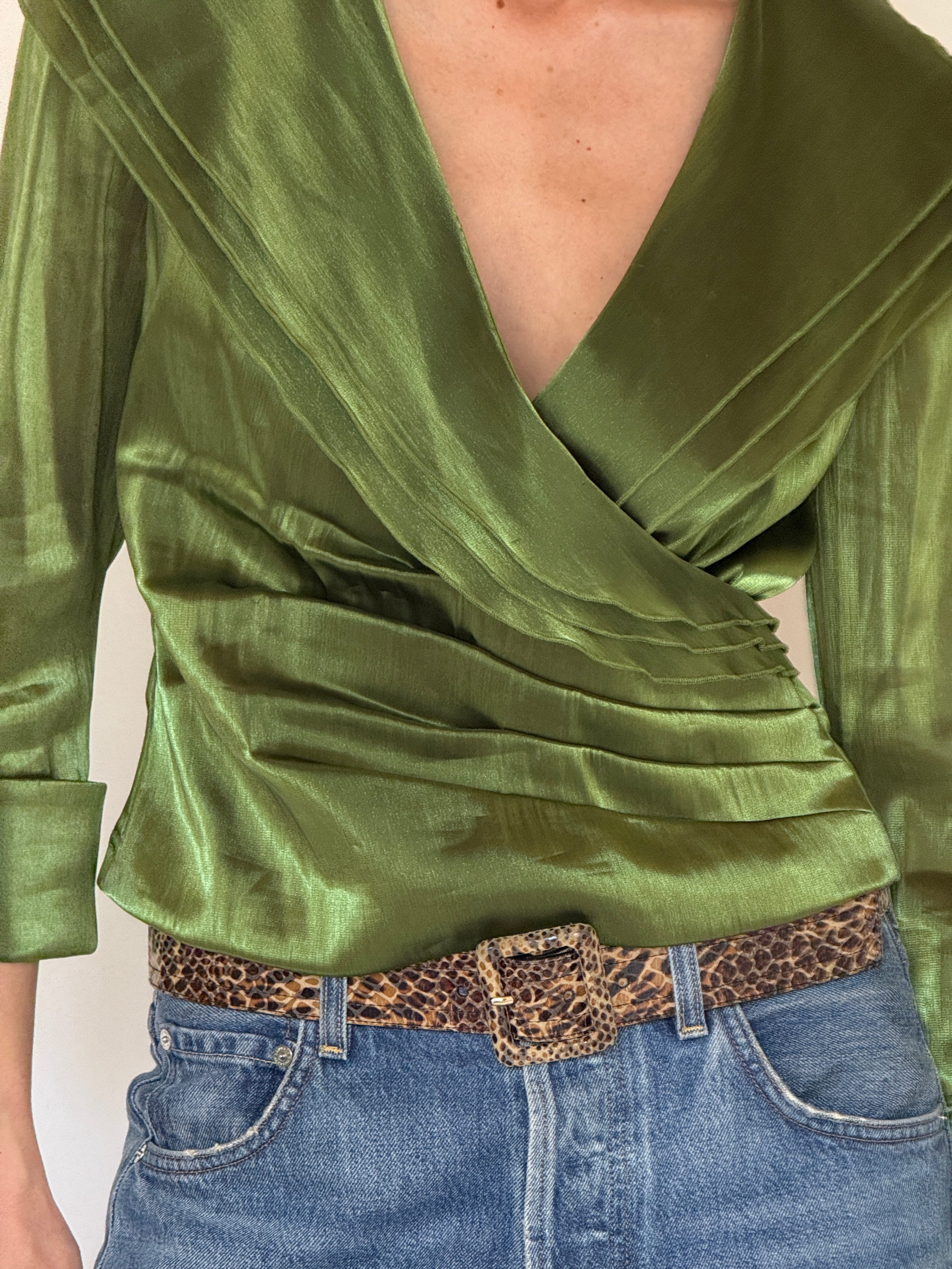 Vintage green satin fabric close-up