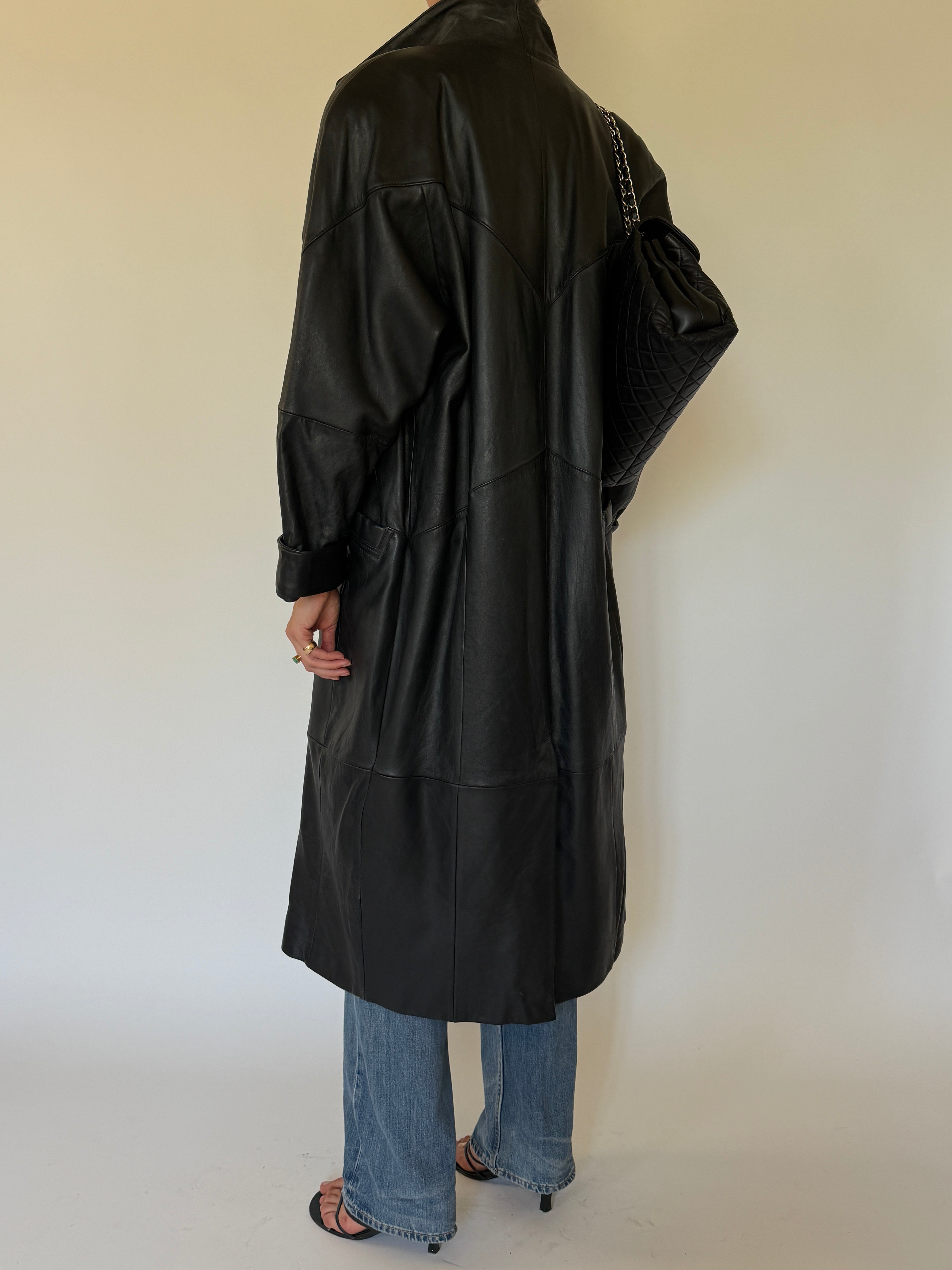 Vintage black leather coat back view