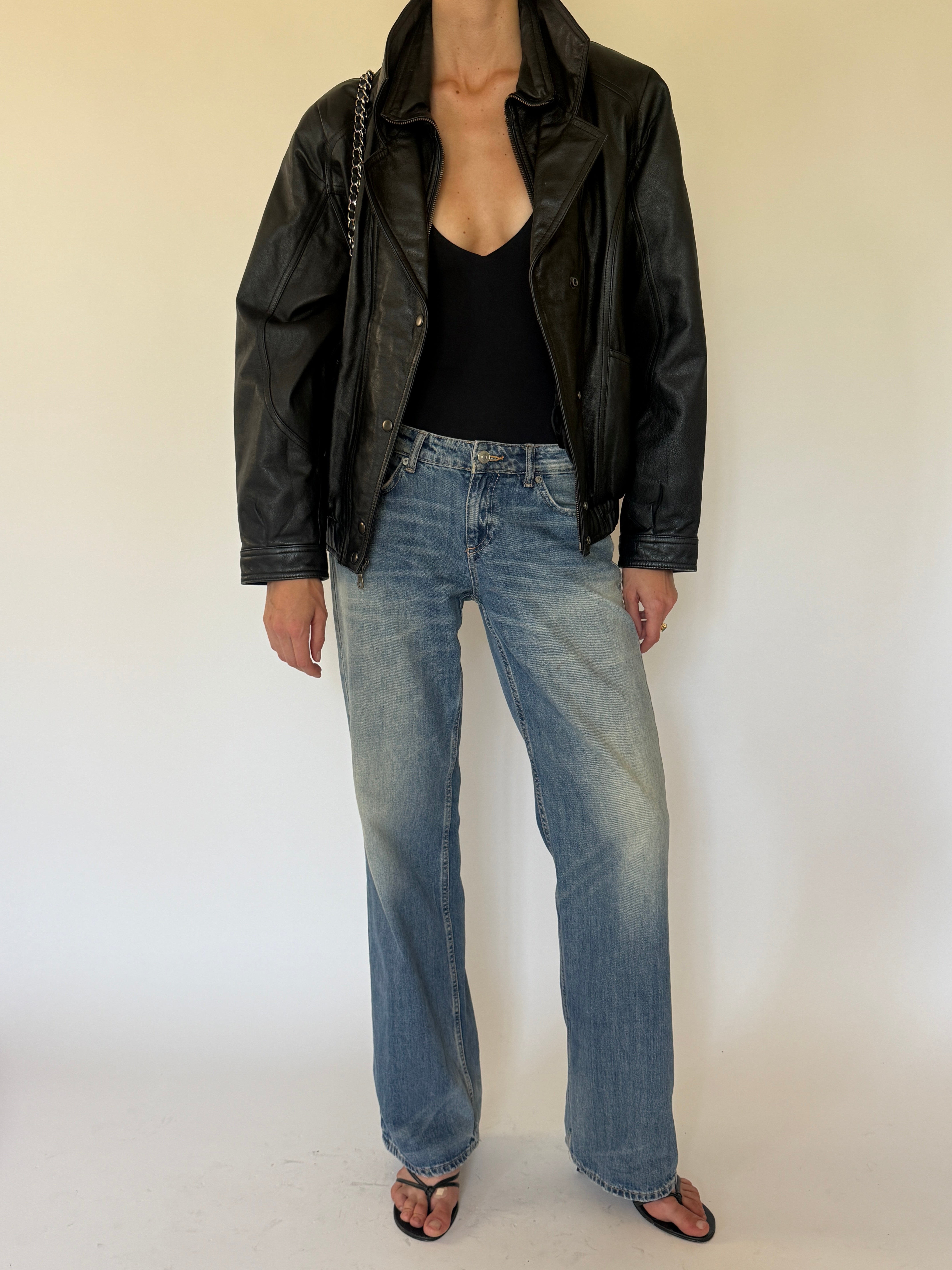 Vintage leather bomber zip and snap button detail