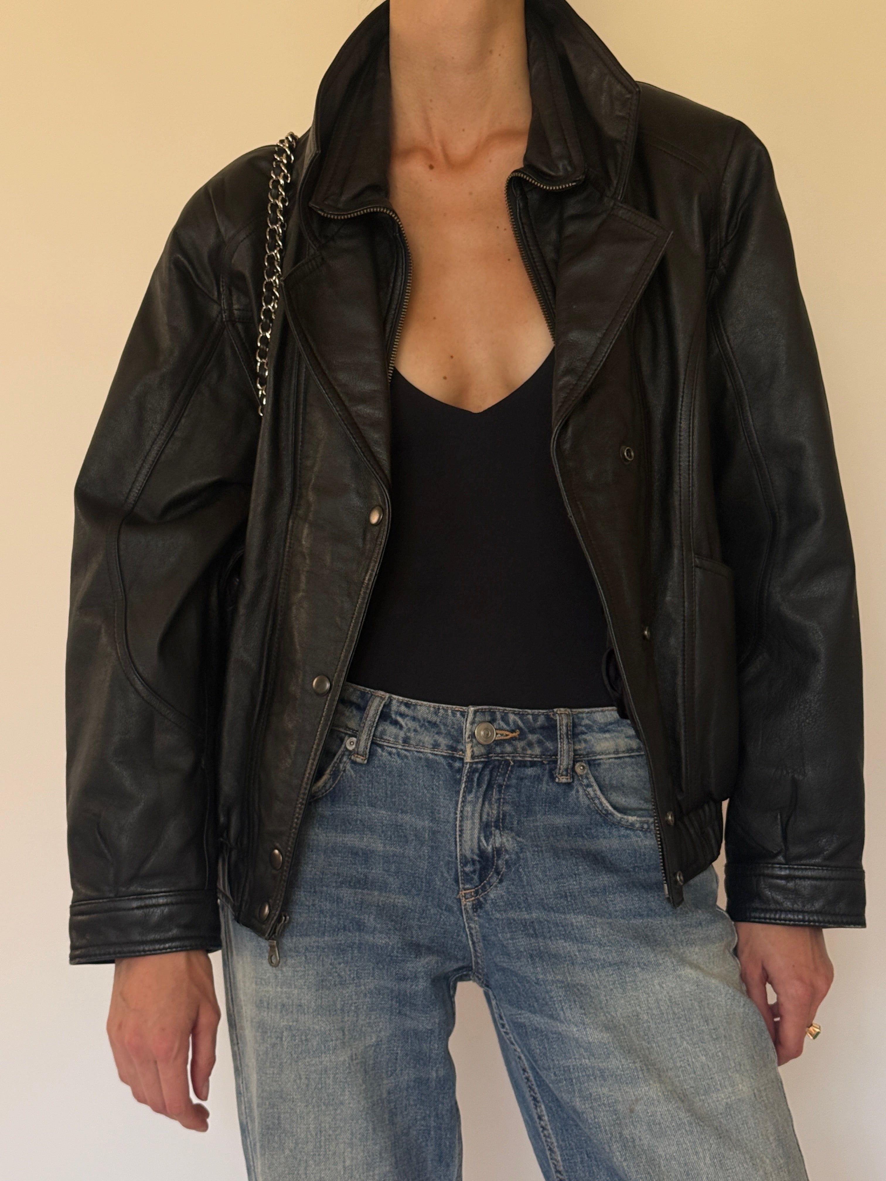 Vintage oversized black leather bomber jacket front view