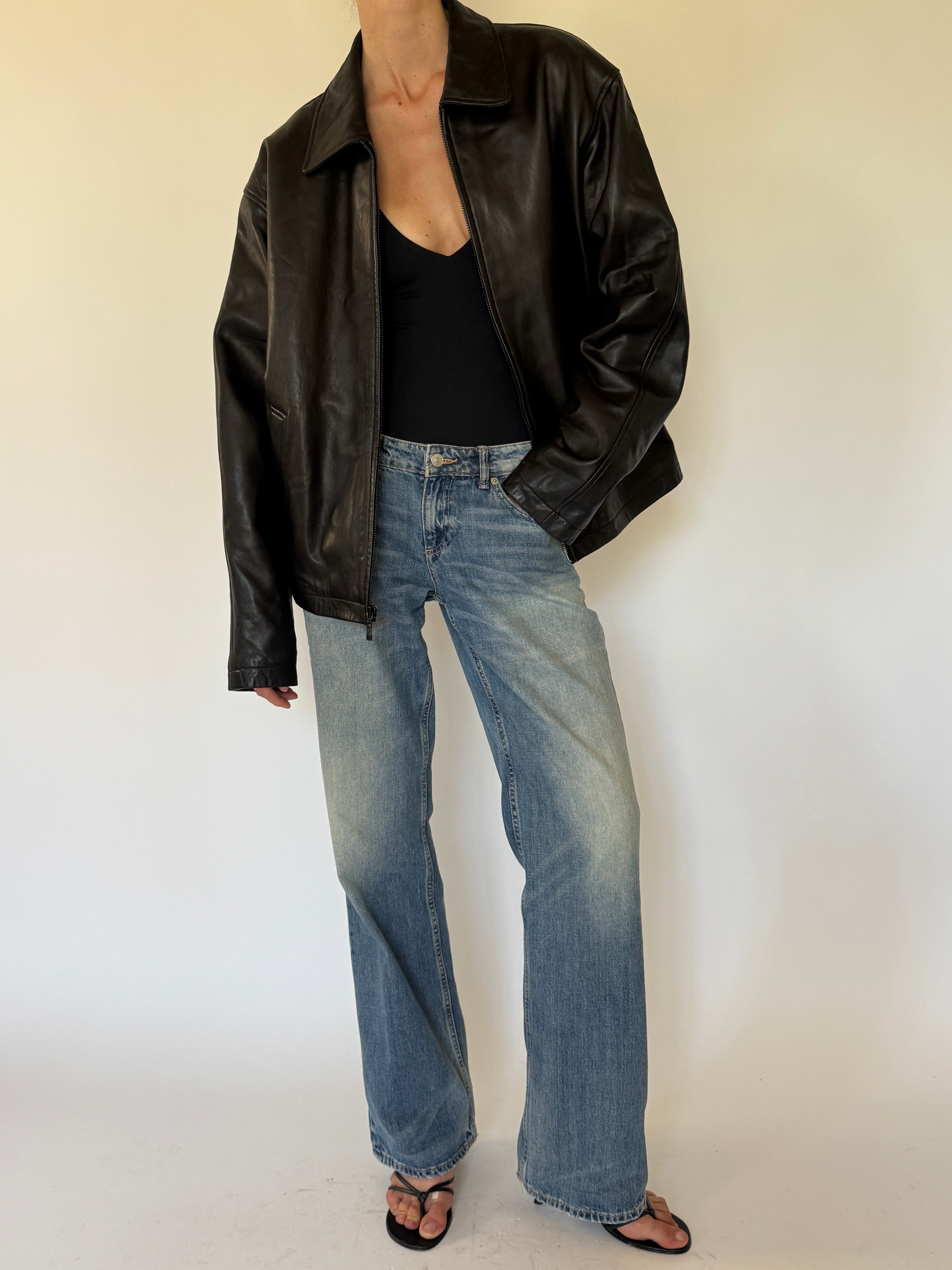 Vintage oversized black leather jacket front view