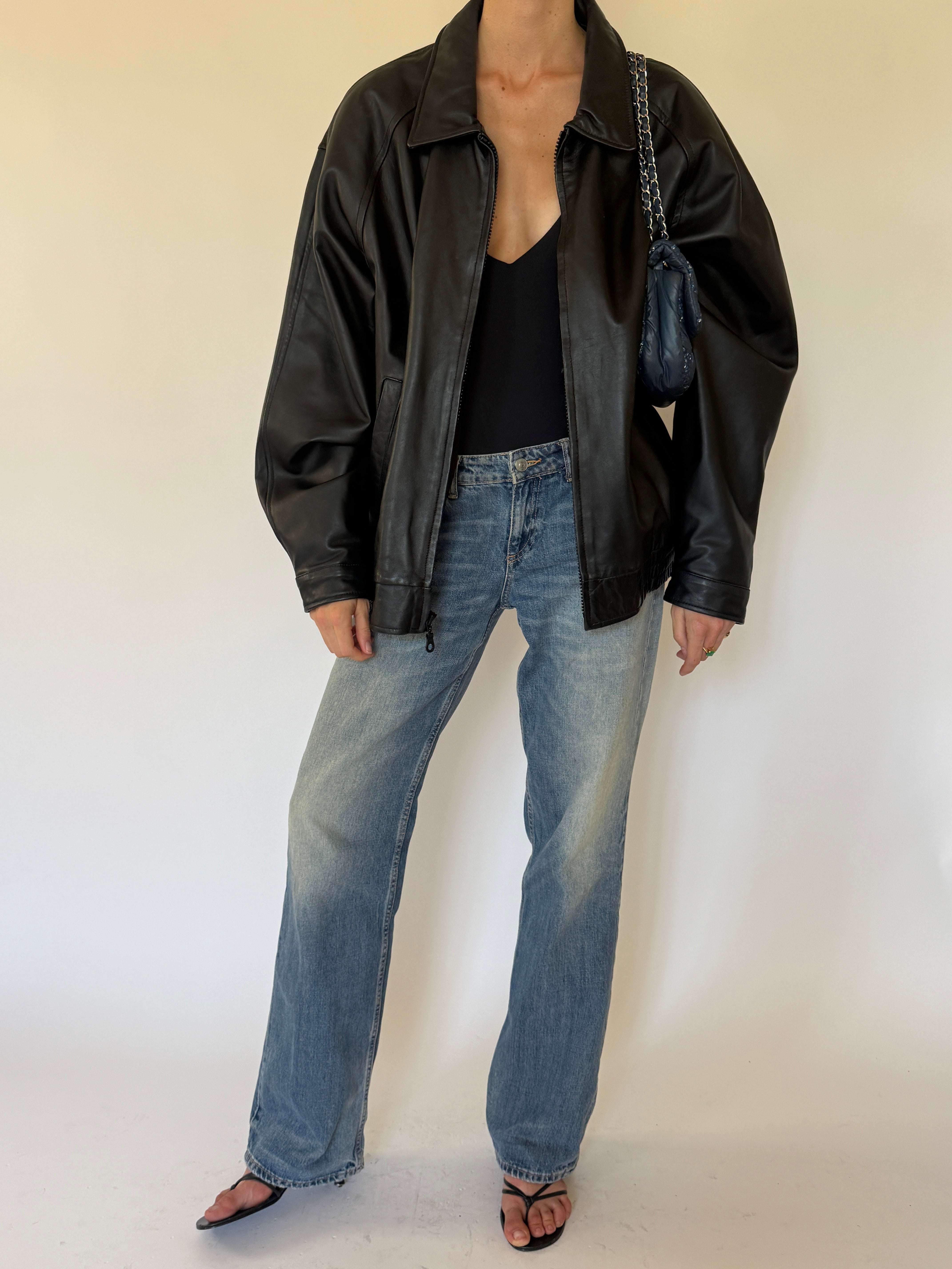 Vintage oversized black leather jacket front view