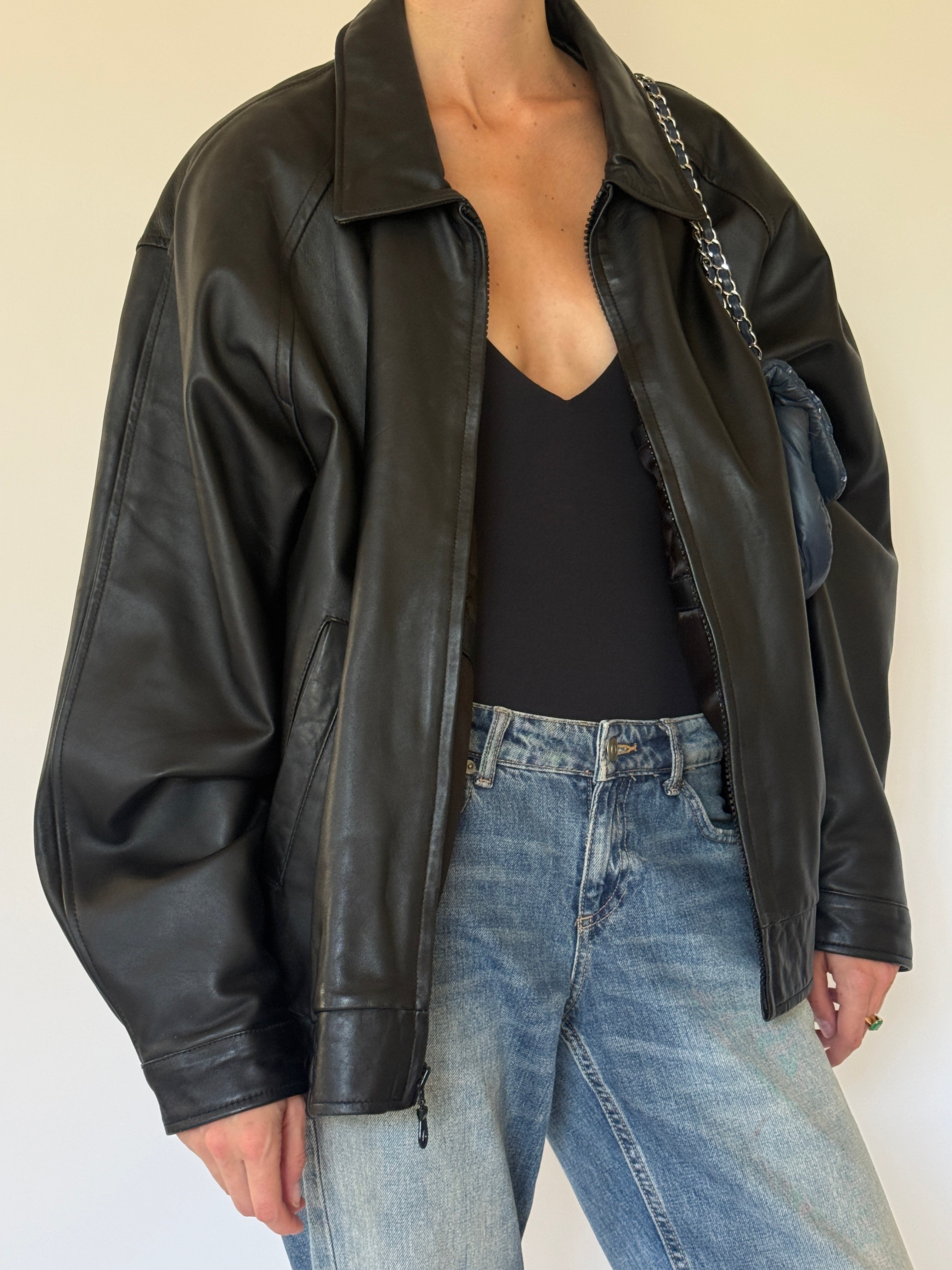 Vintage smooth black leather close-up