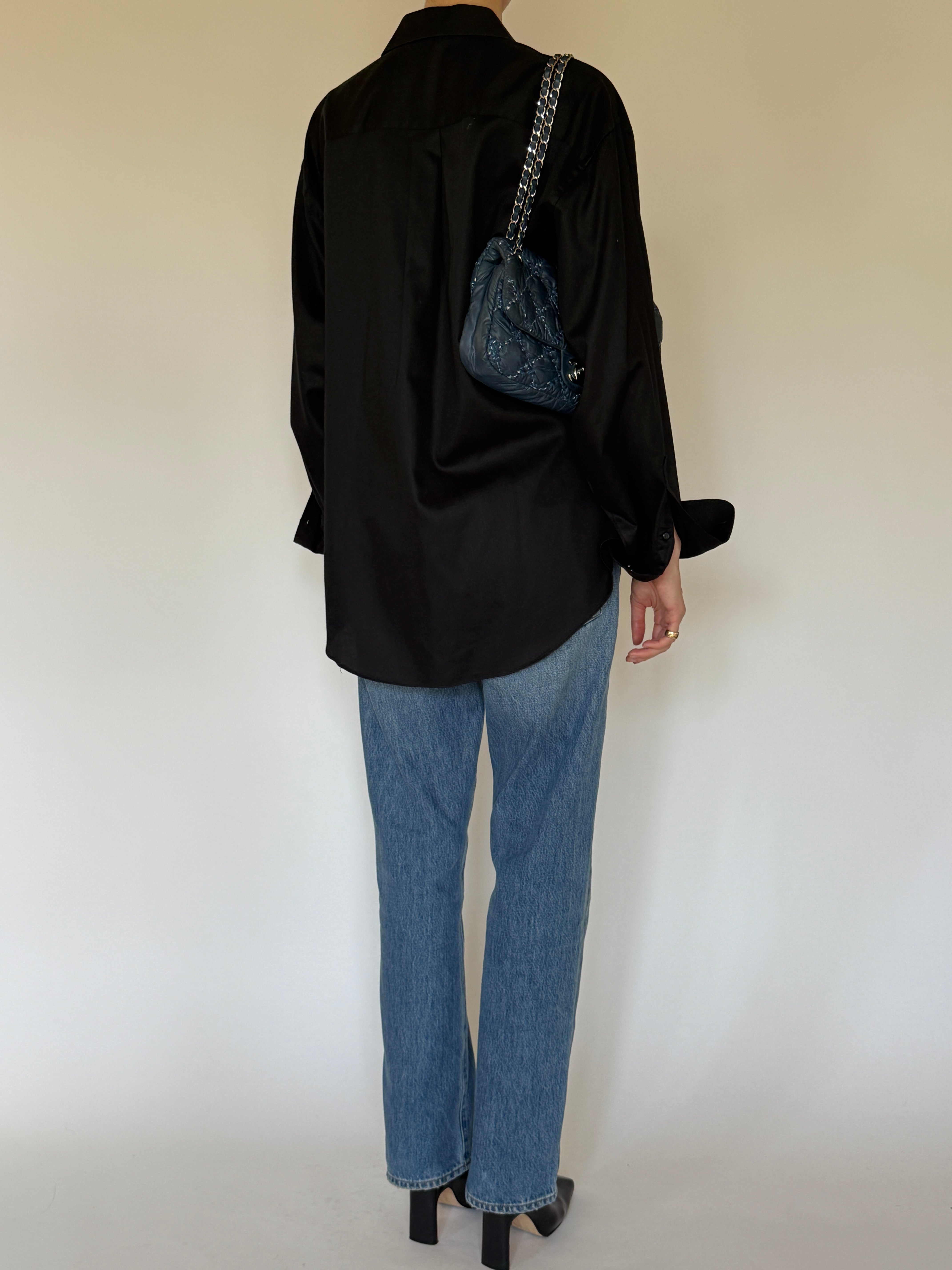 Vintage black button-up shirt back view