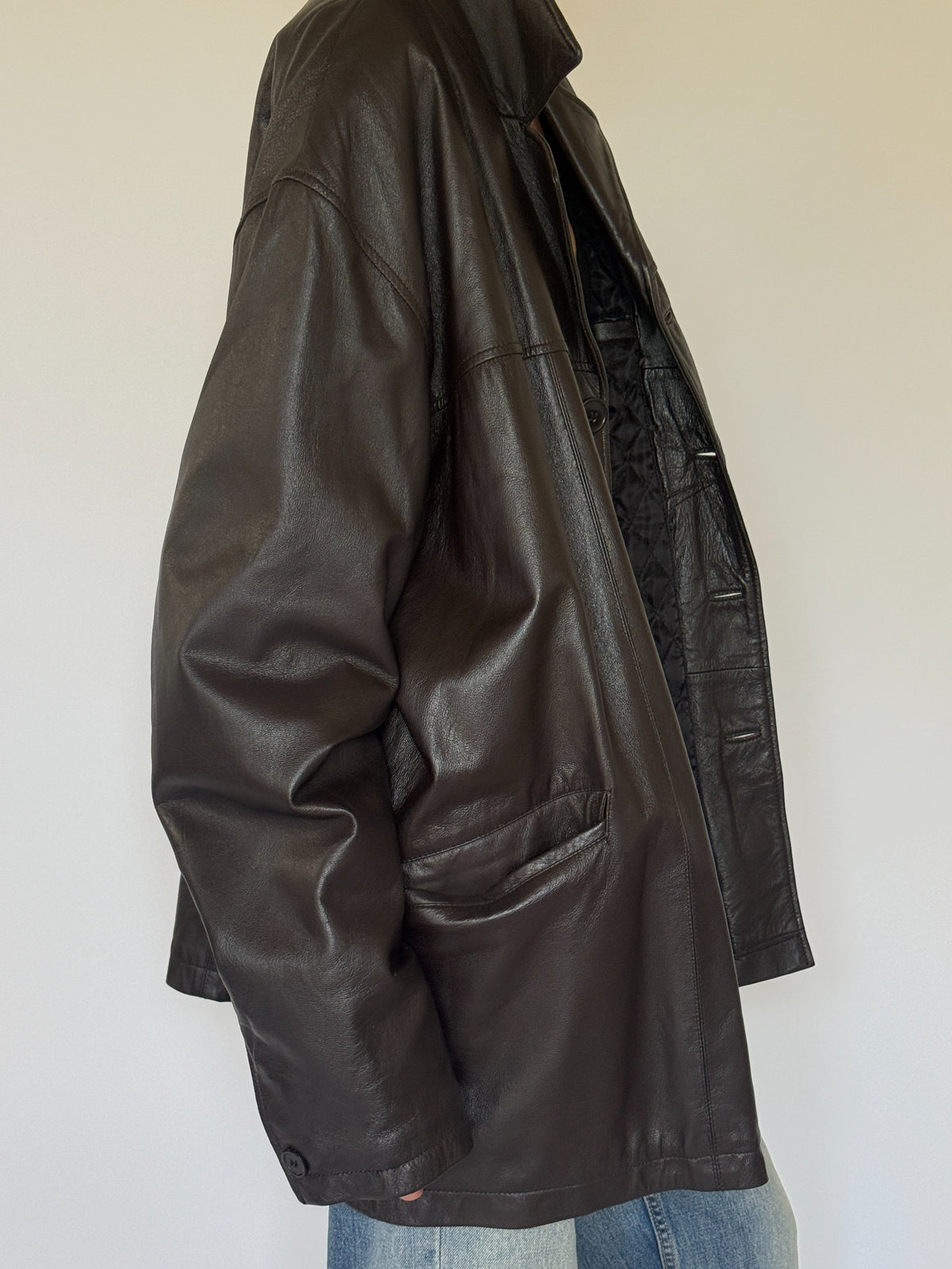 Vintage oversized dark brown leather jacket pocket detail