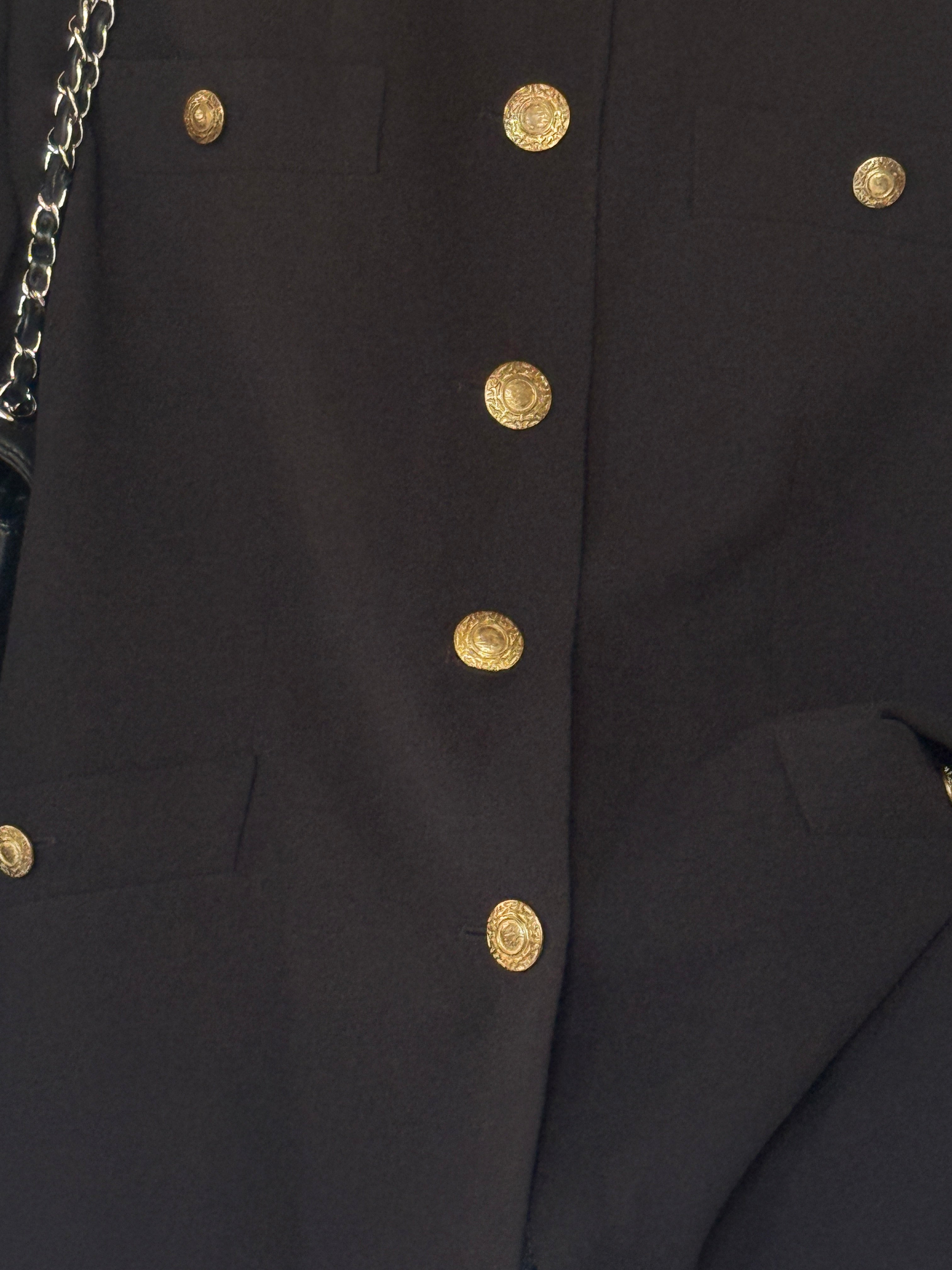 Vintage gold-tone button close-up