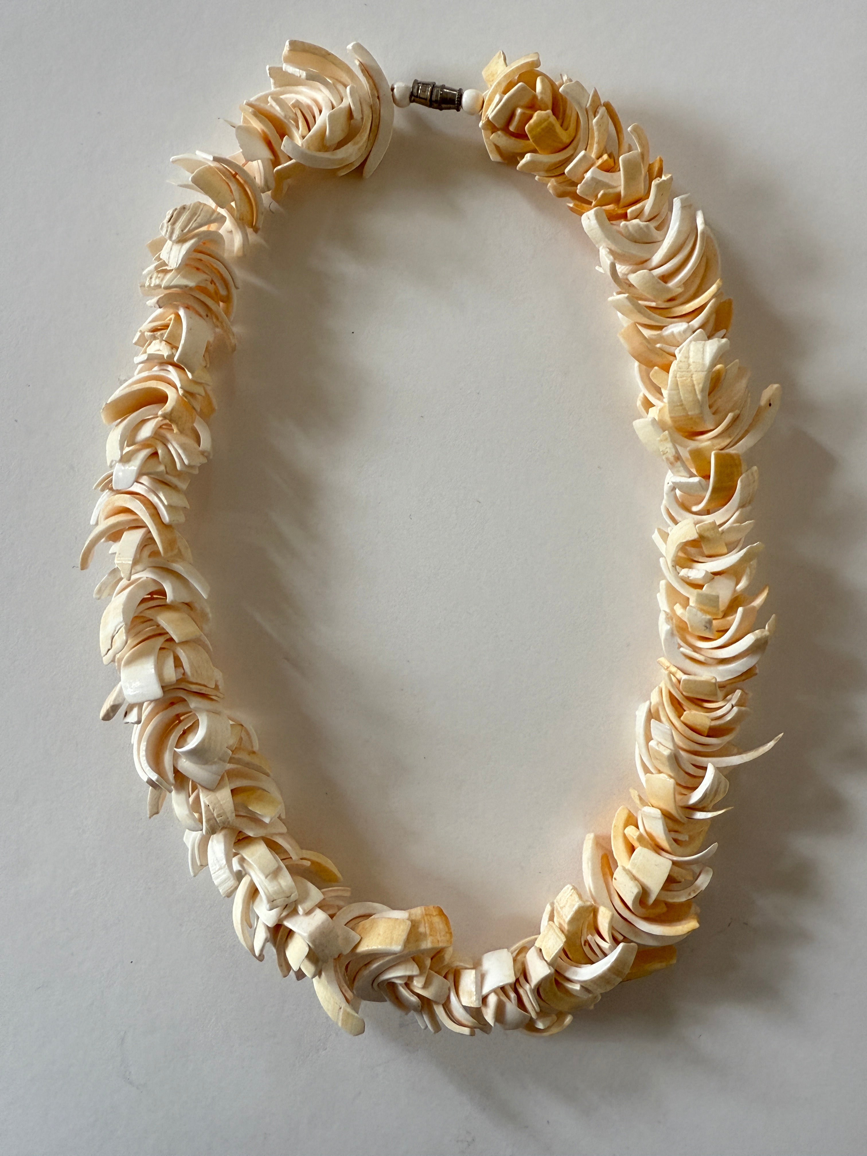 Vintage ivory shell necklace flat lay view