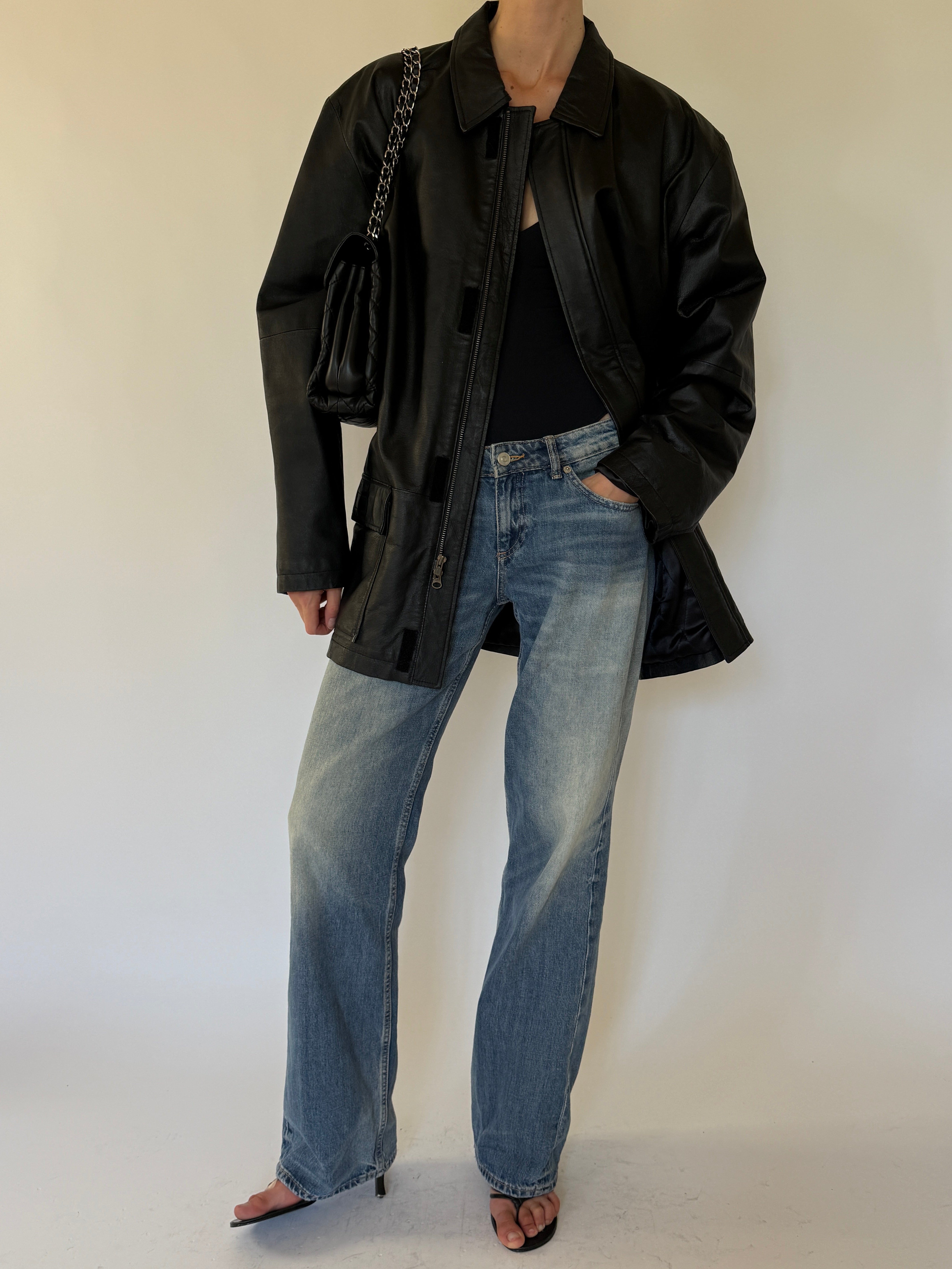 Vintage black leather jacket front view