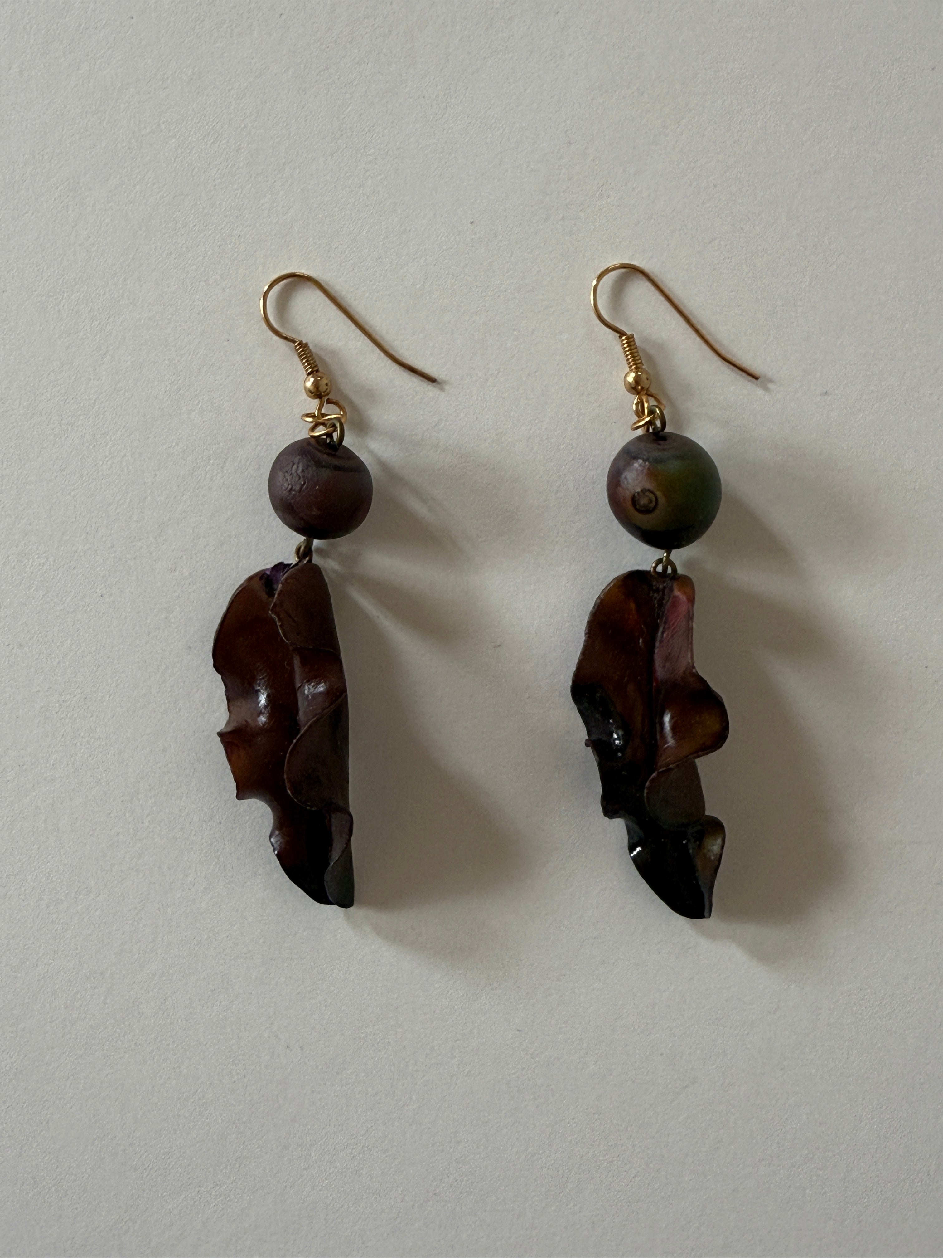Vintage brown sculptural earrings front view
