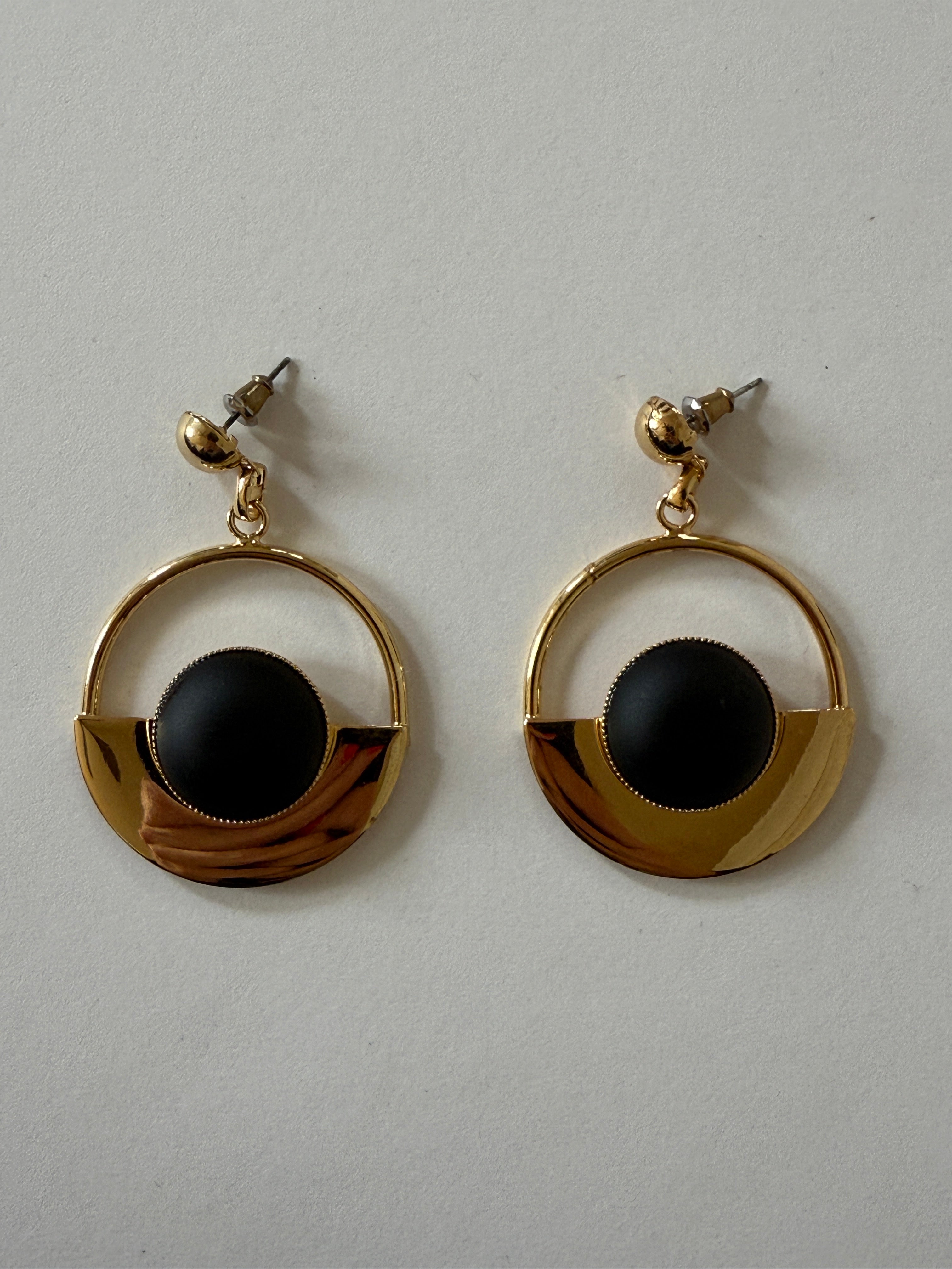 Vintage gold-tone earrings with matte black round detail
