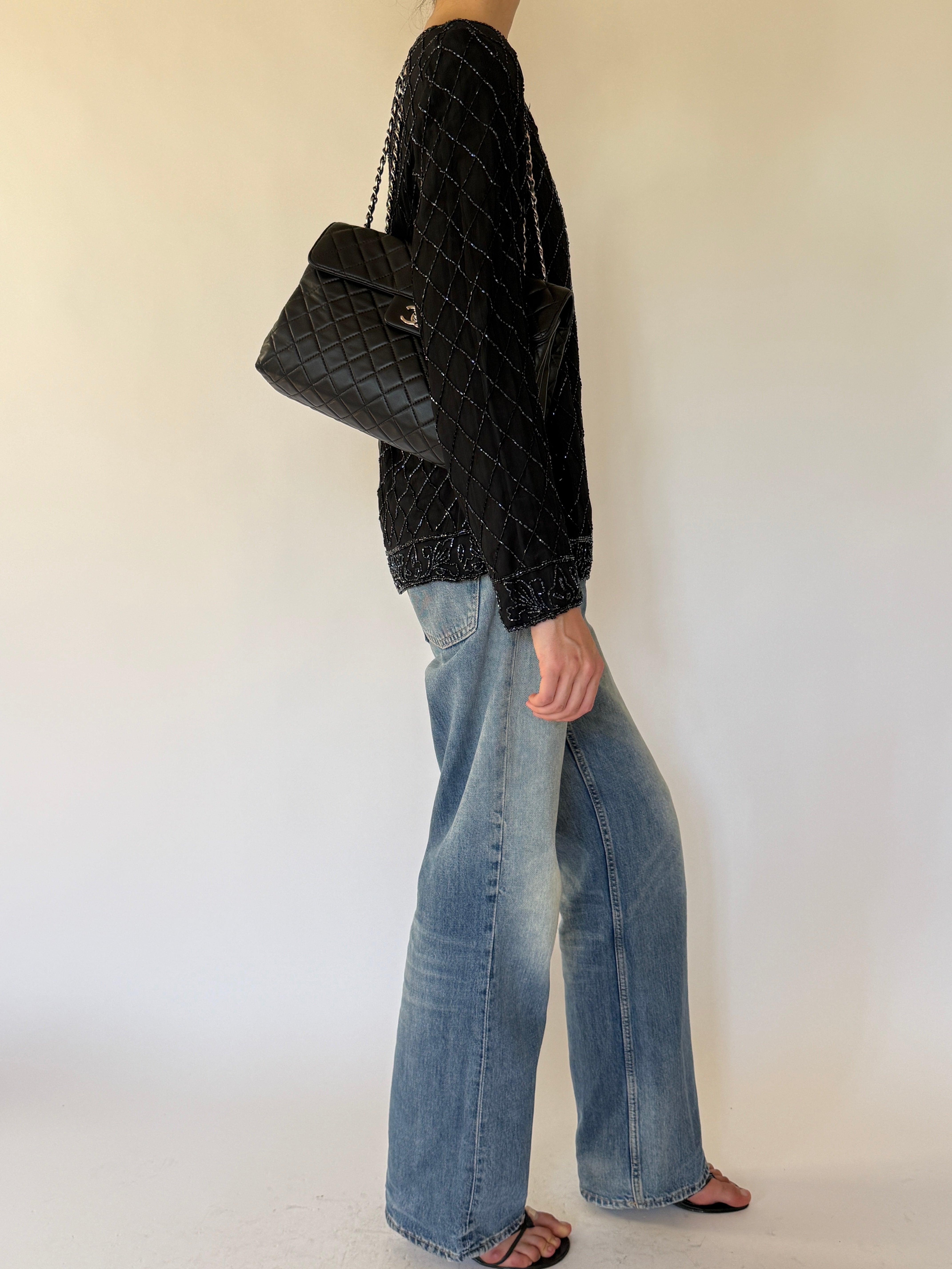 Vintage black silk beaded evening jacket side view
