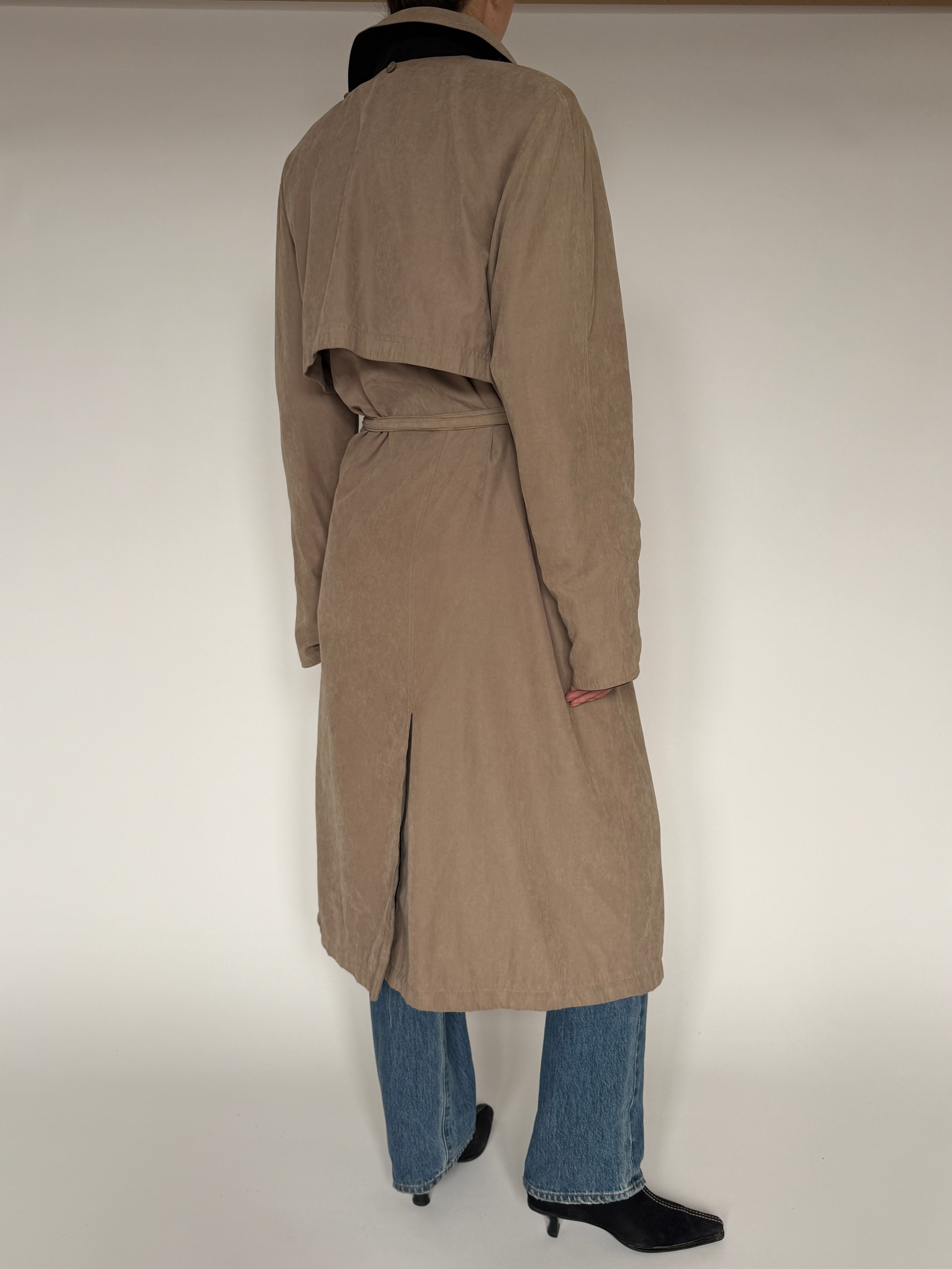 Vintage tan belted trench coat back view
