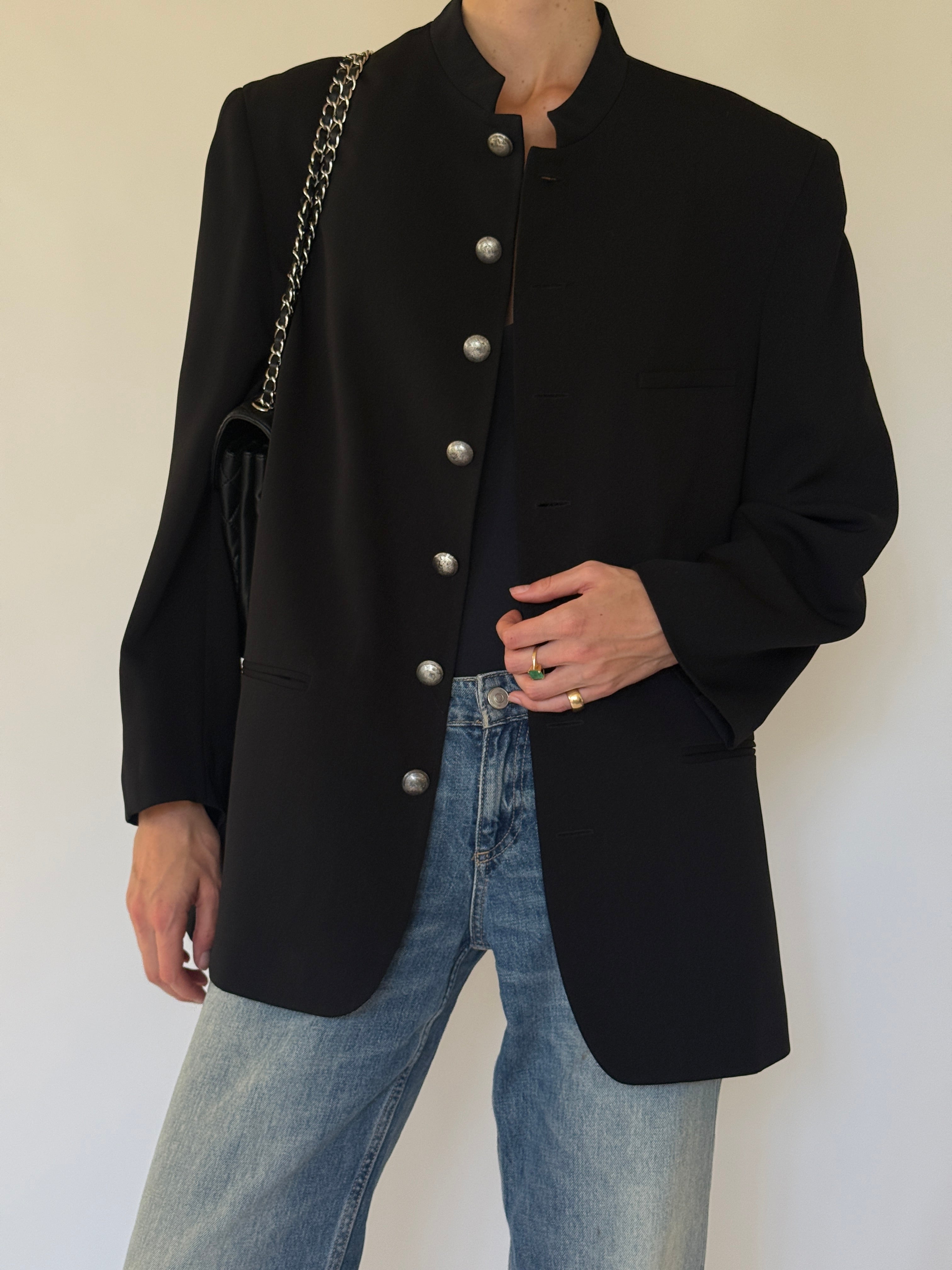 Vintage black blazer fabric close-up
