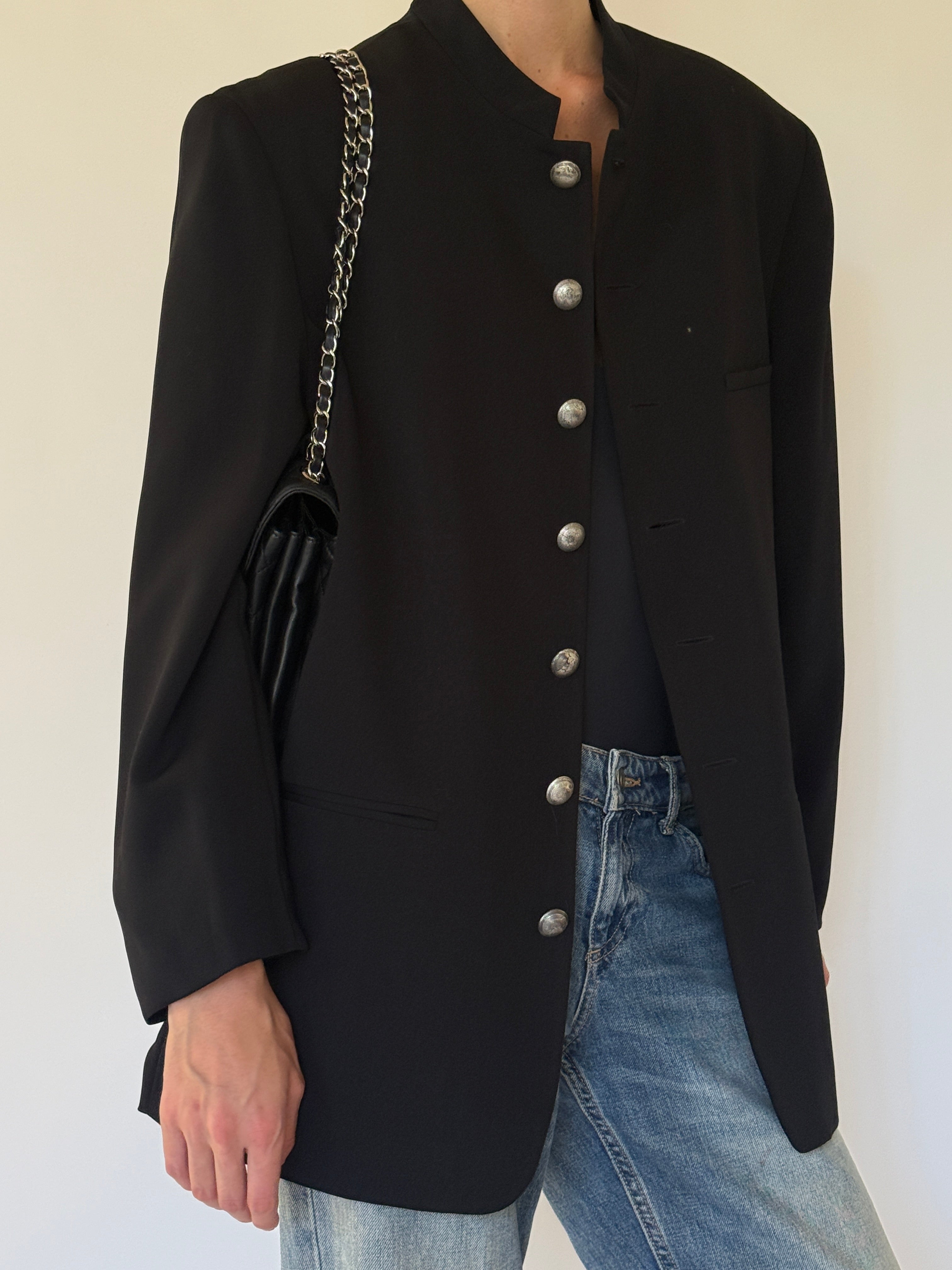 Vintage black blazer fabric close-up