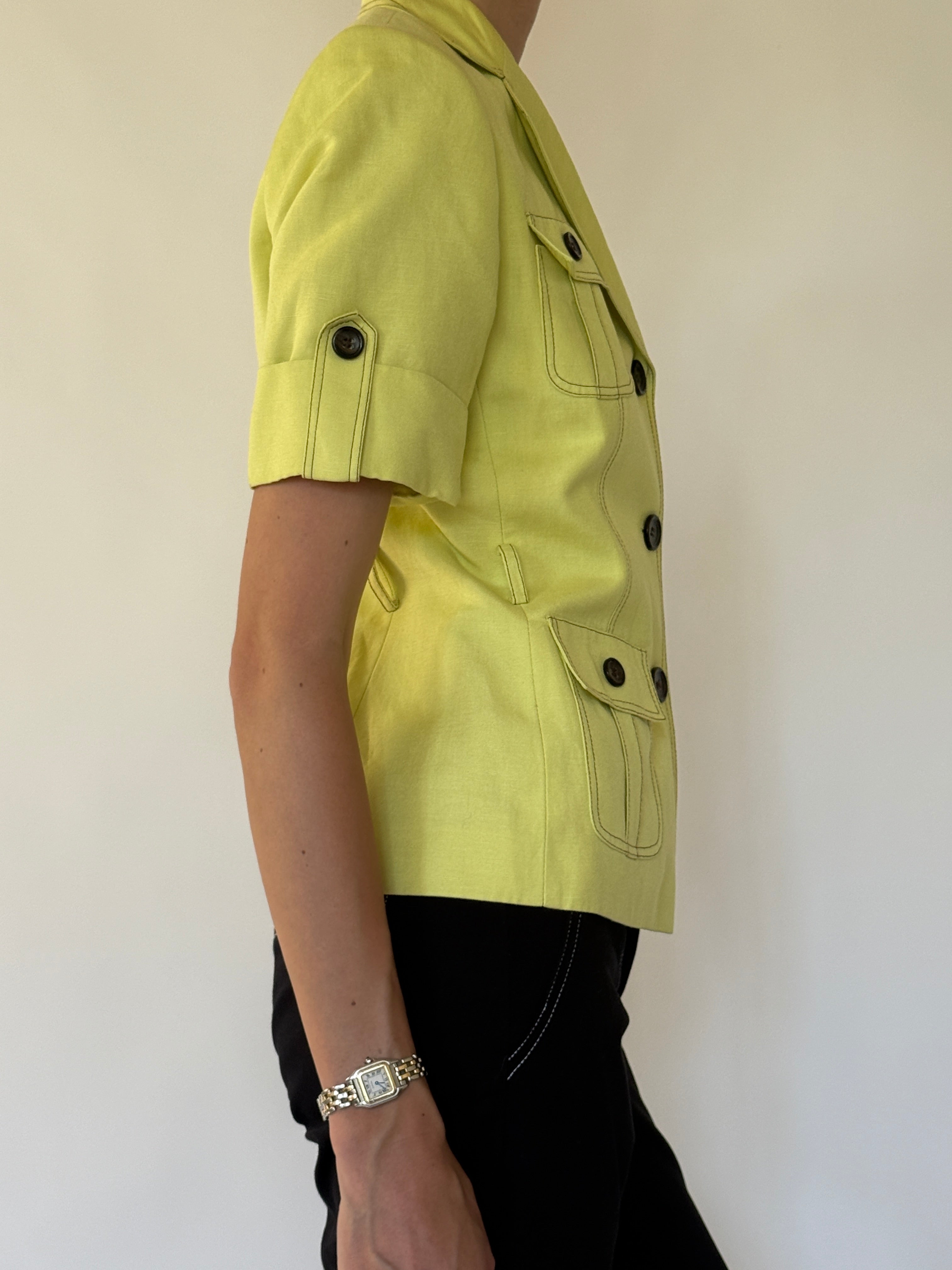 Vintage lime green short-sleeve safari jacket side view