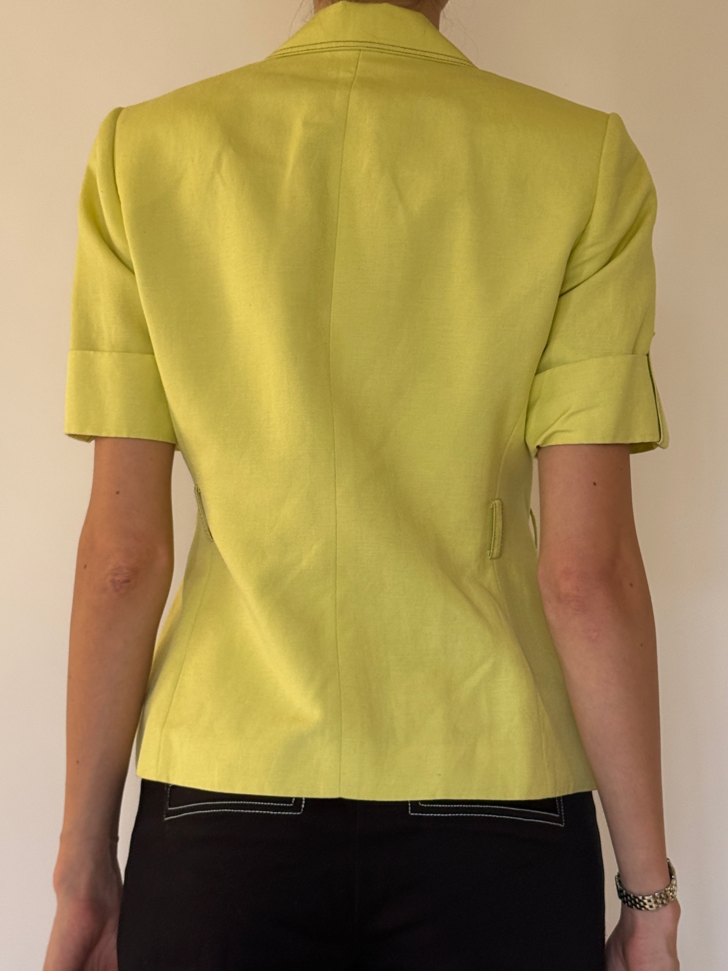 Vintage lime green short-sleeve safari jacket back view