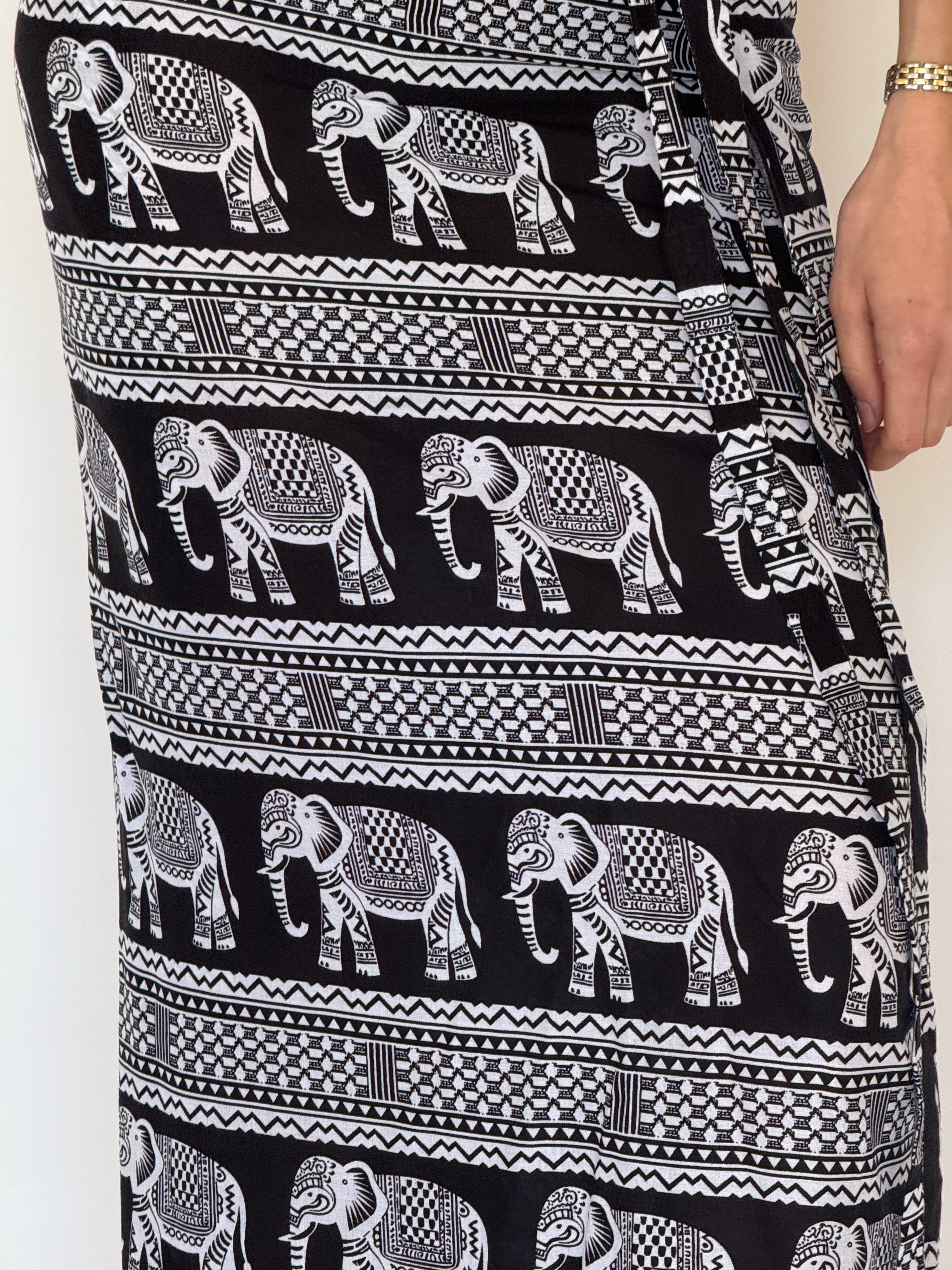 Vintage black and white elephant print wrap sarong fabric close-up detail