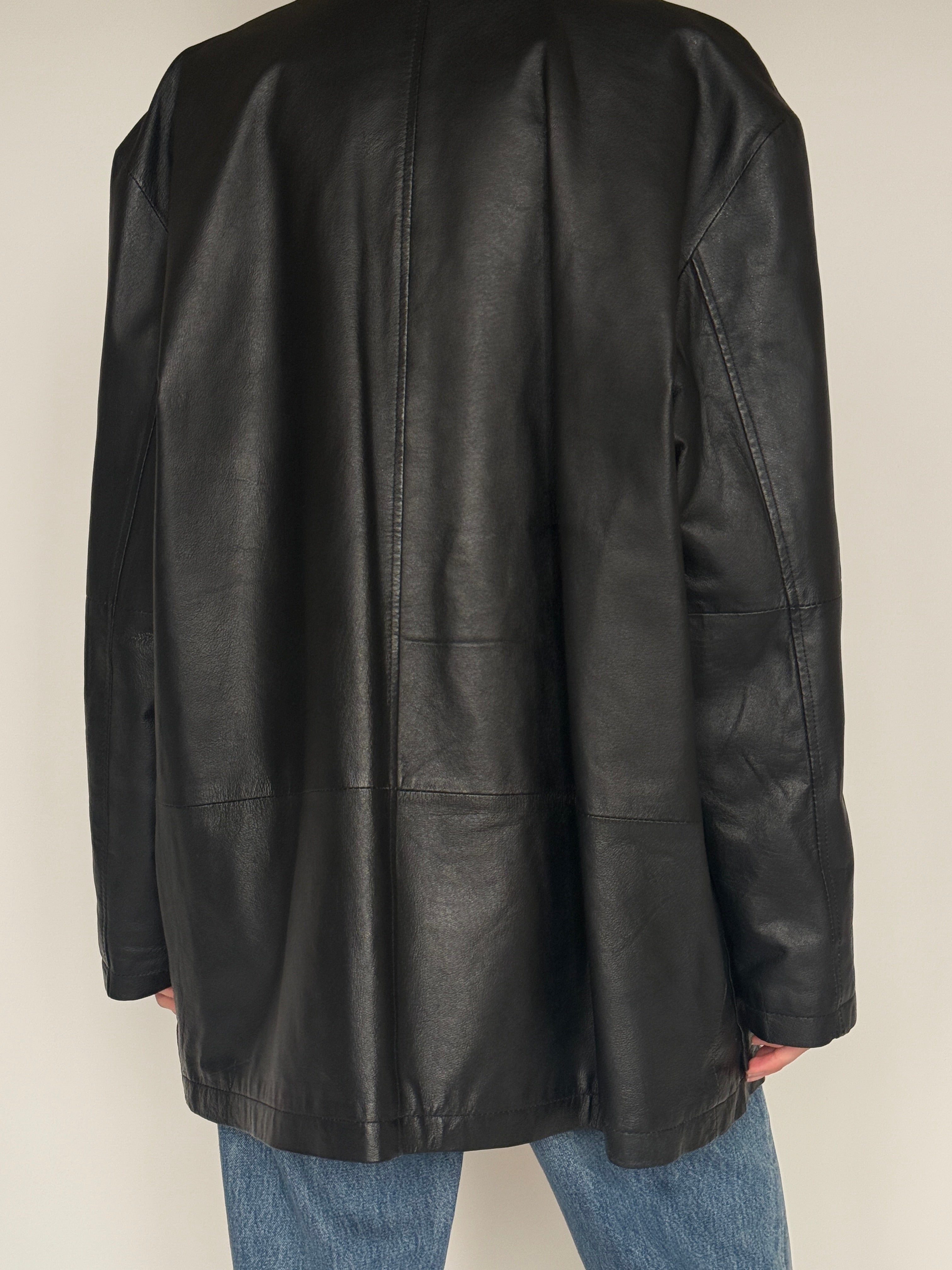 Vintage black leather jacket back view