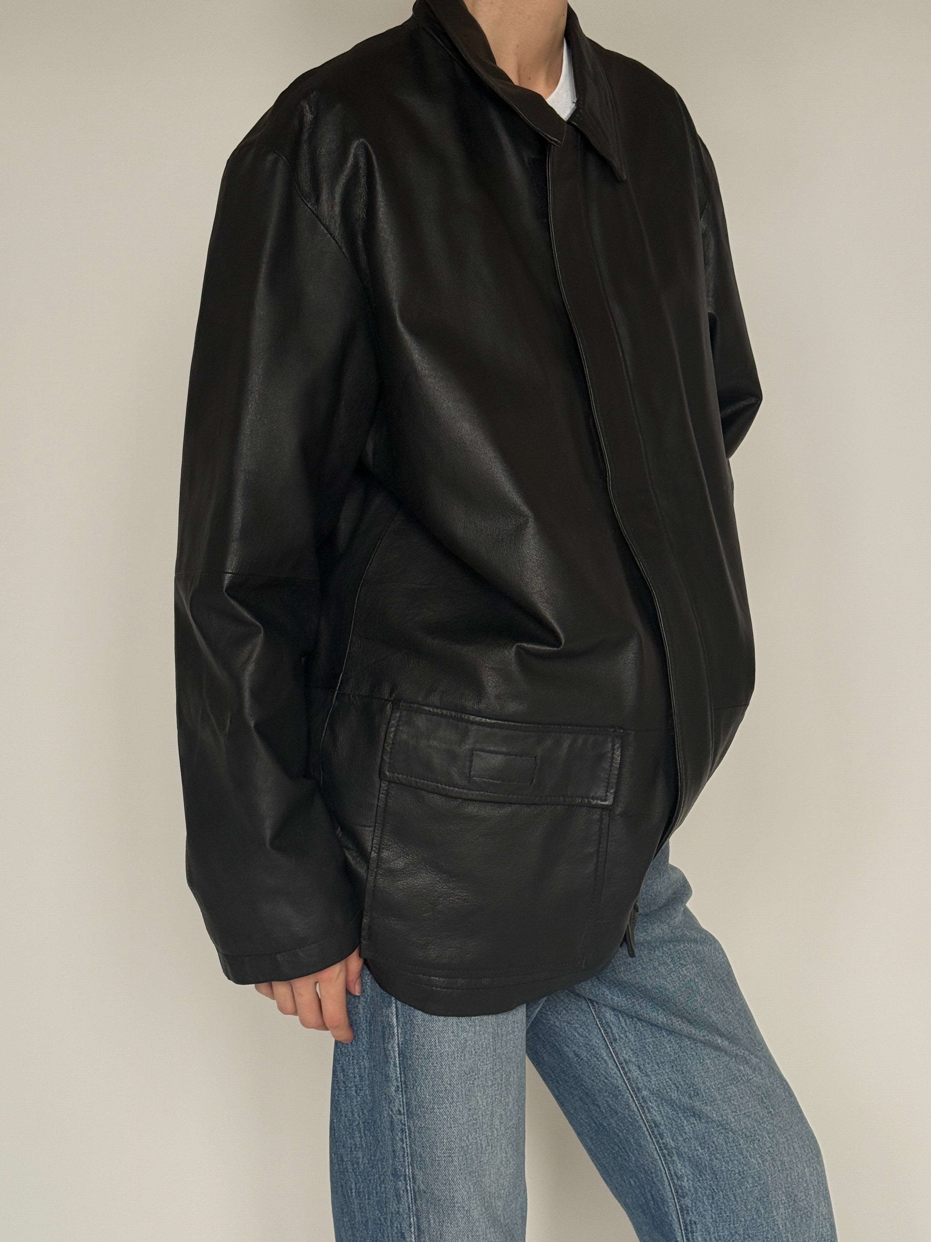 Vintage black leather jacket side view