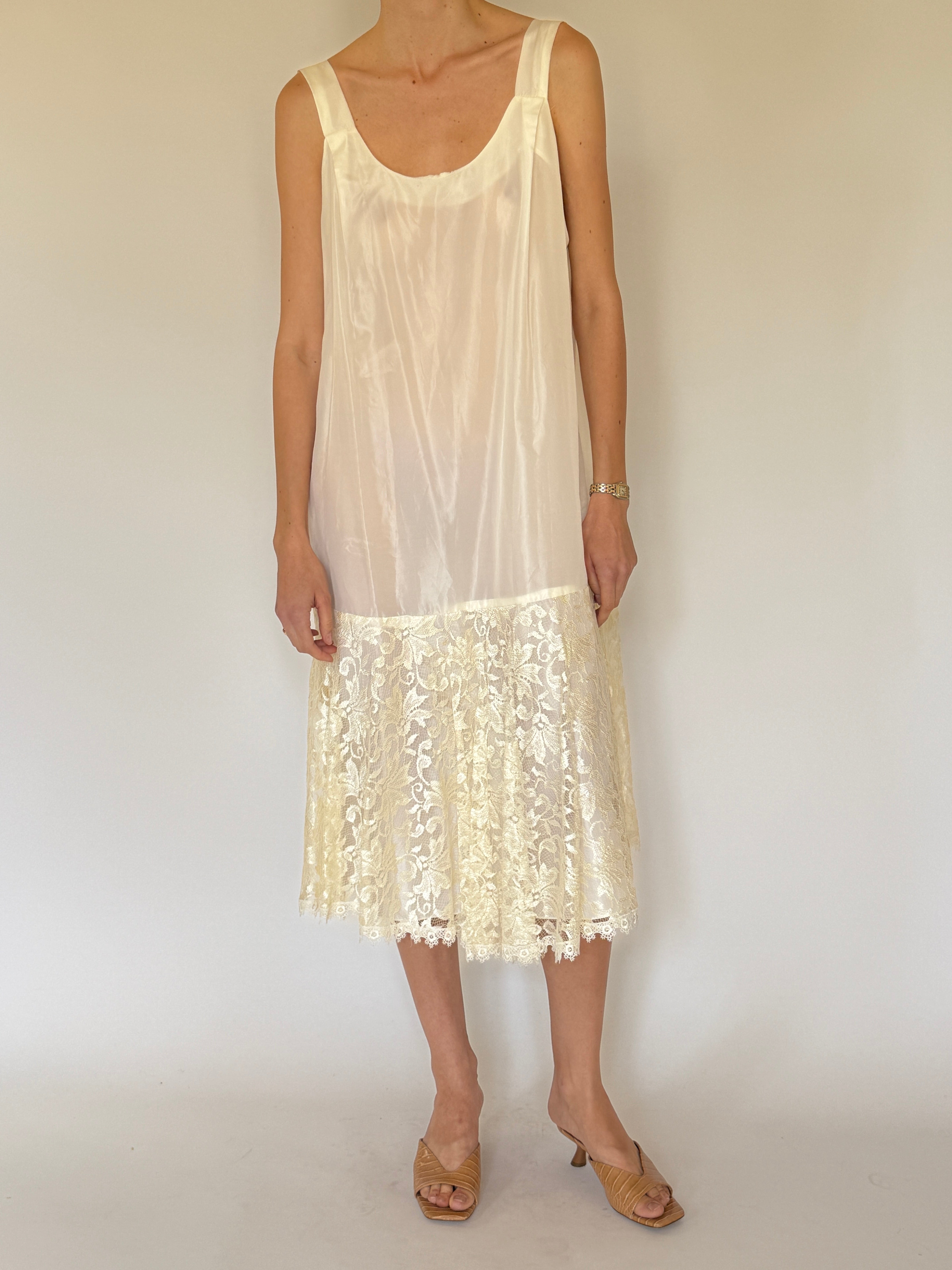 Vintage ivory slip dress worn on its own