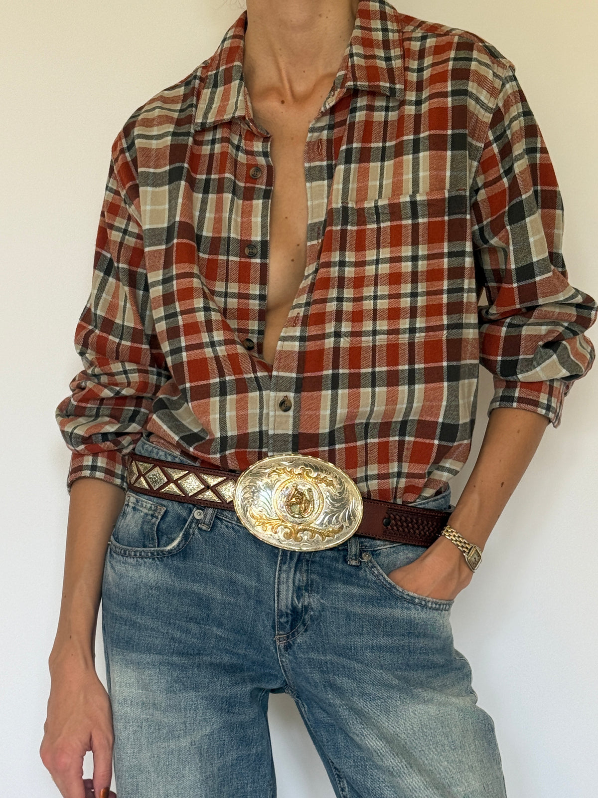 Vintage Western-inspired plaid flannel shirt cotton fabric close-up