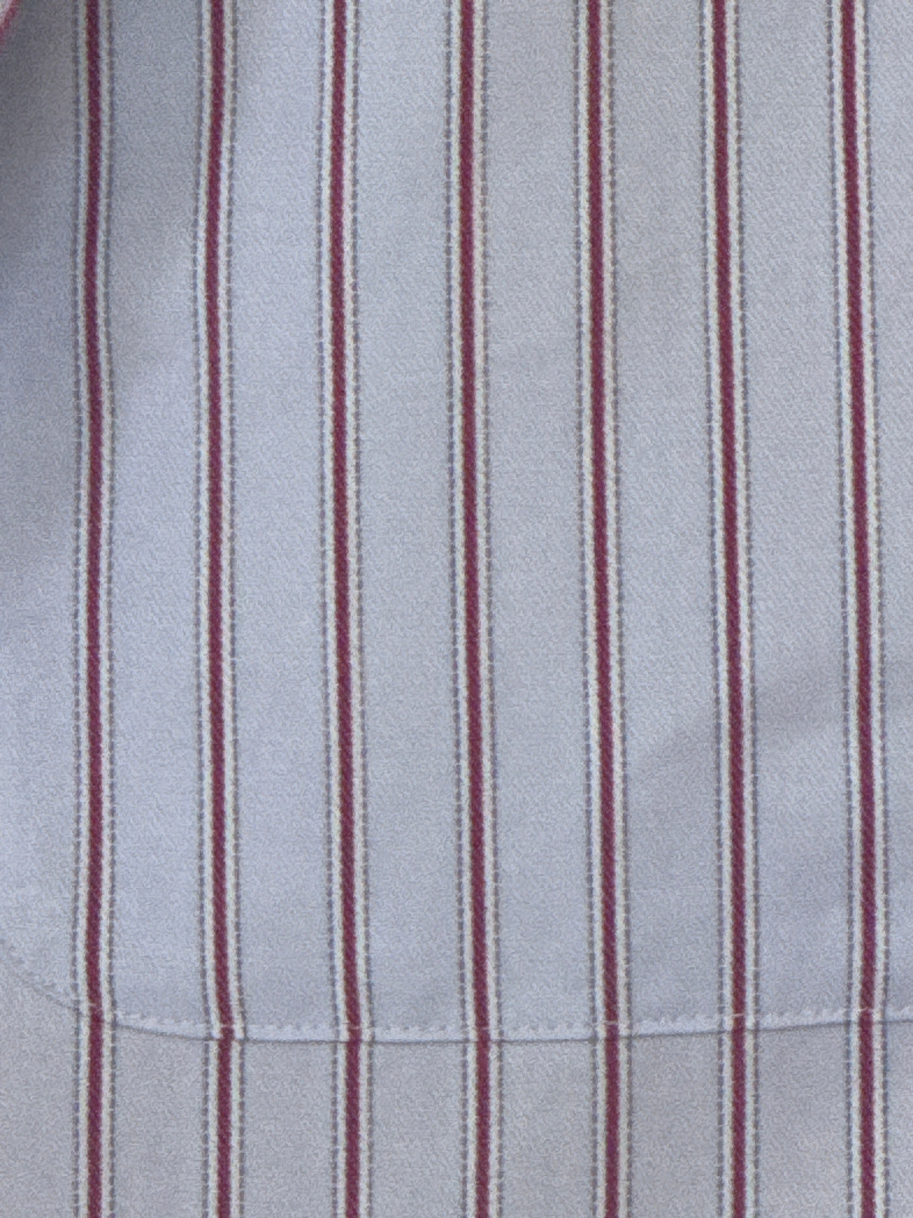 Vintage light blue and burgundy stripe fabric close-up