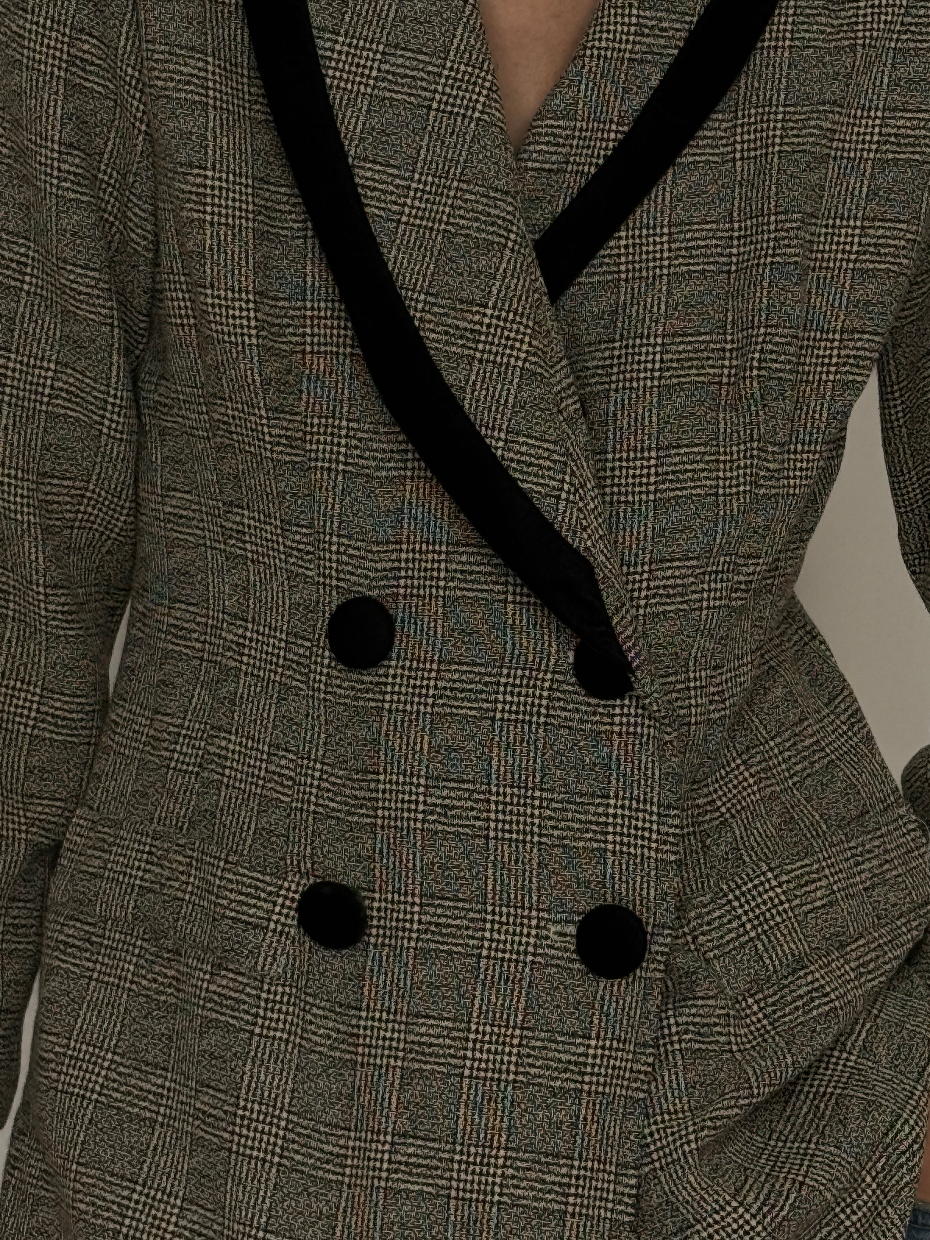 Vintage plaid blazer fabric close-up