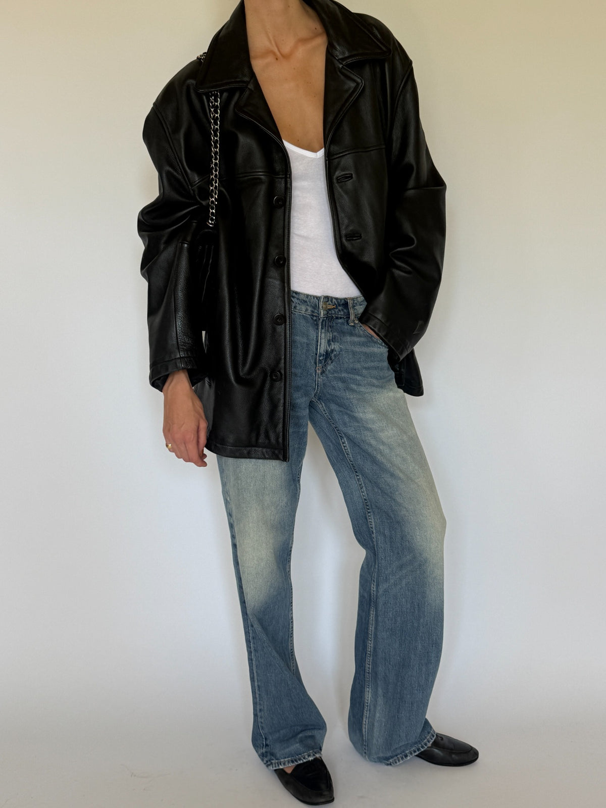 Vintage black leather jacket front view