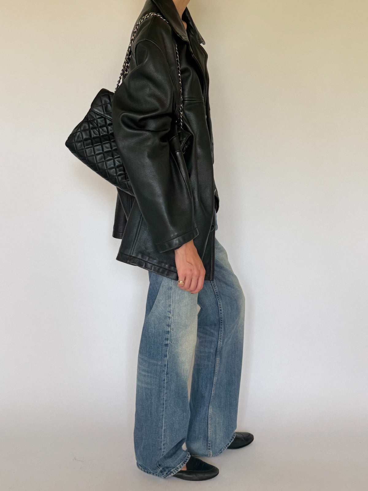 Vintage black leather jacket final side angle
