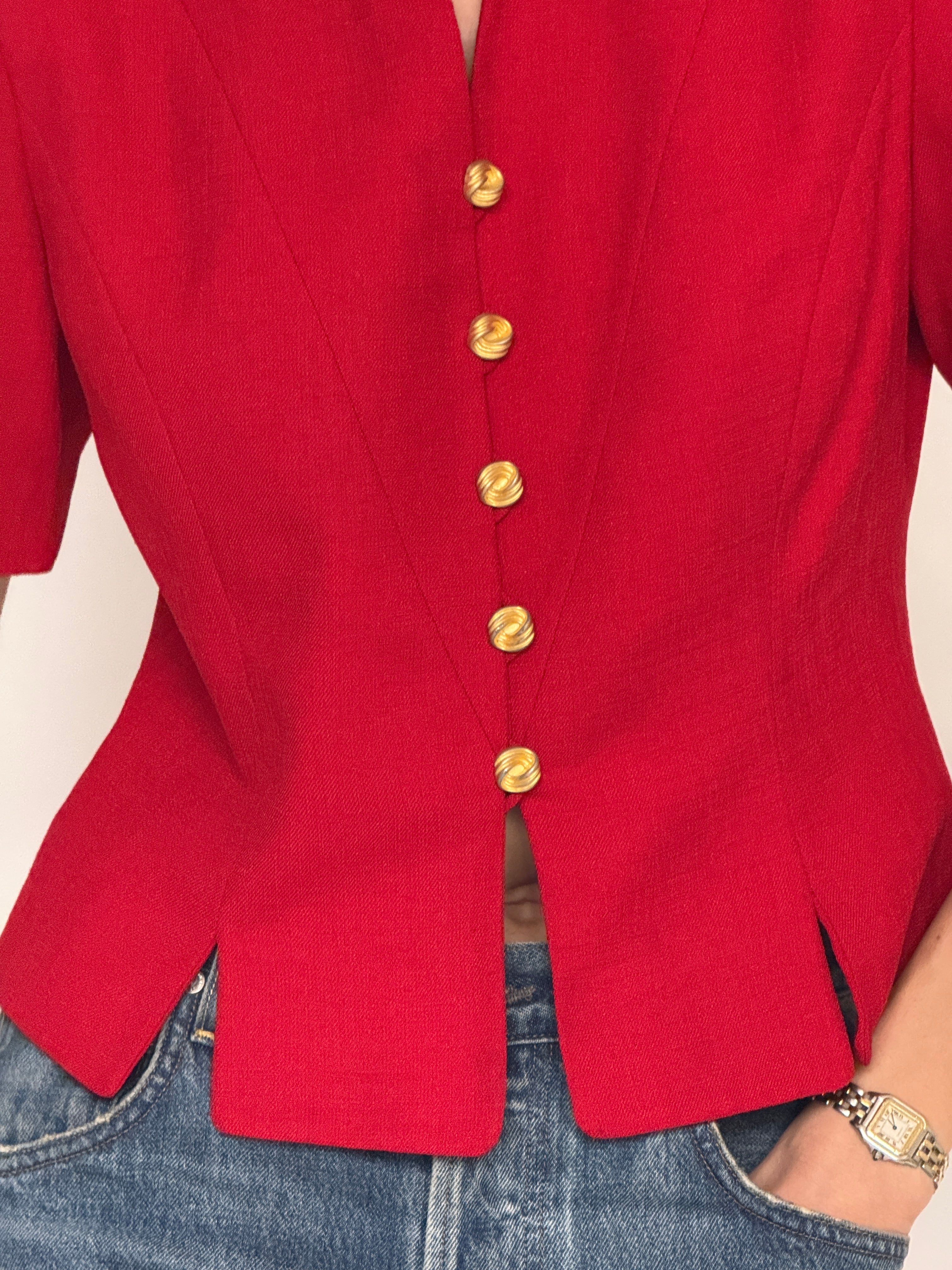 Vintage red structured blazer fabric close-up